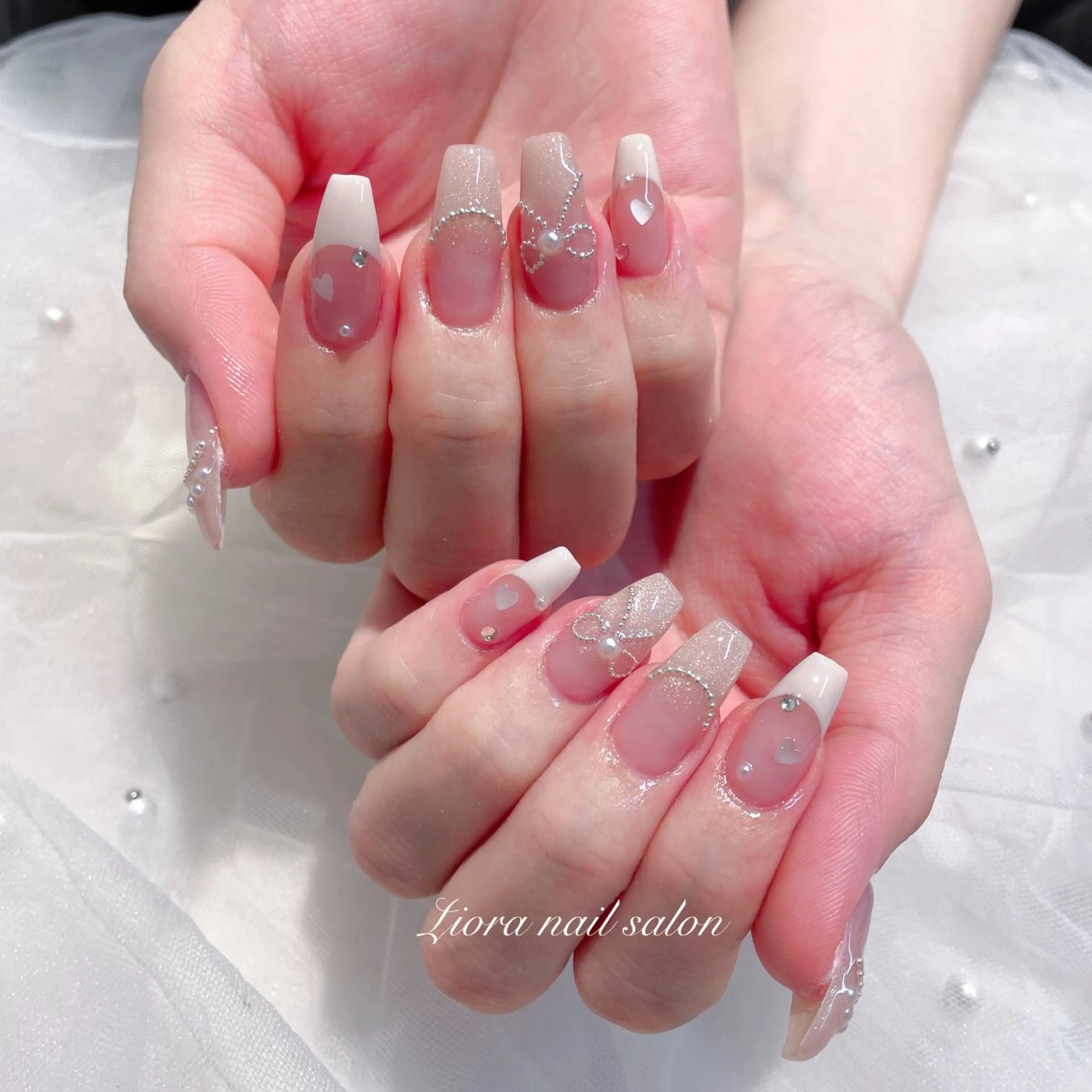 ネイル フレンチネイル ジェルネイル ガーリー グラデーション キラキラネイル ハンドネイル Liora ネイルサロン所属・Liora nail salonのネイルデザイン