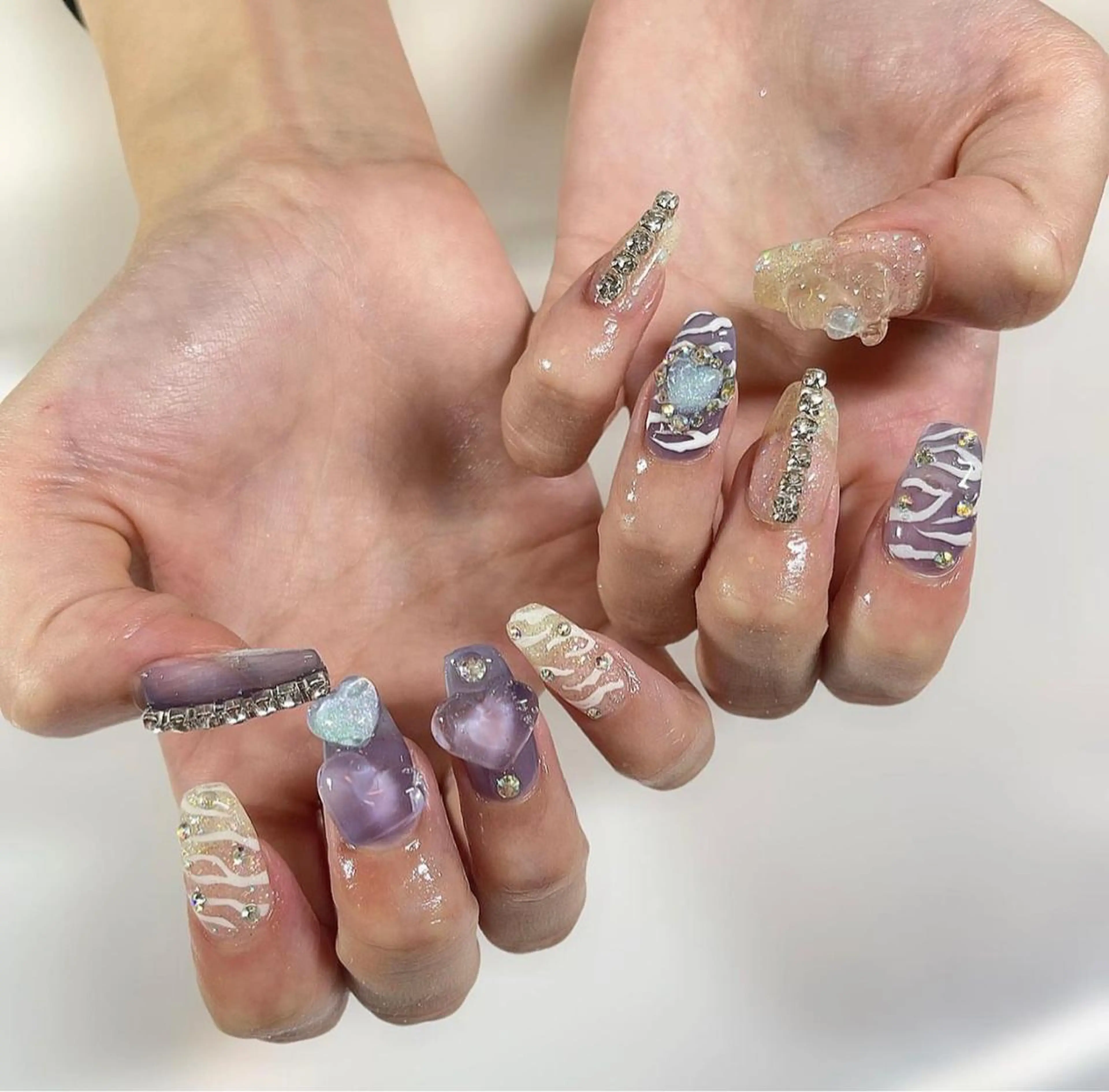 ネイル アニマル柄 アートネイル グラデーション ハート キラキラネイル ハンドネイル nail salon hoLLyhockのネイルデザイン