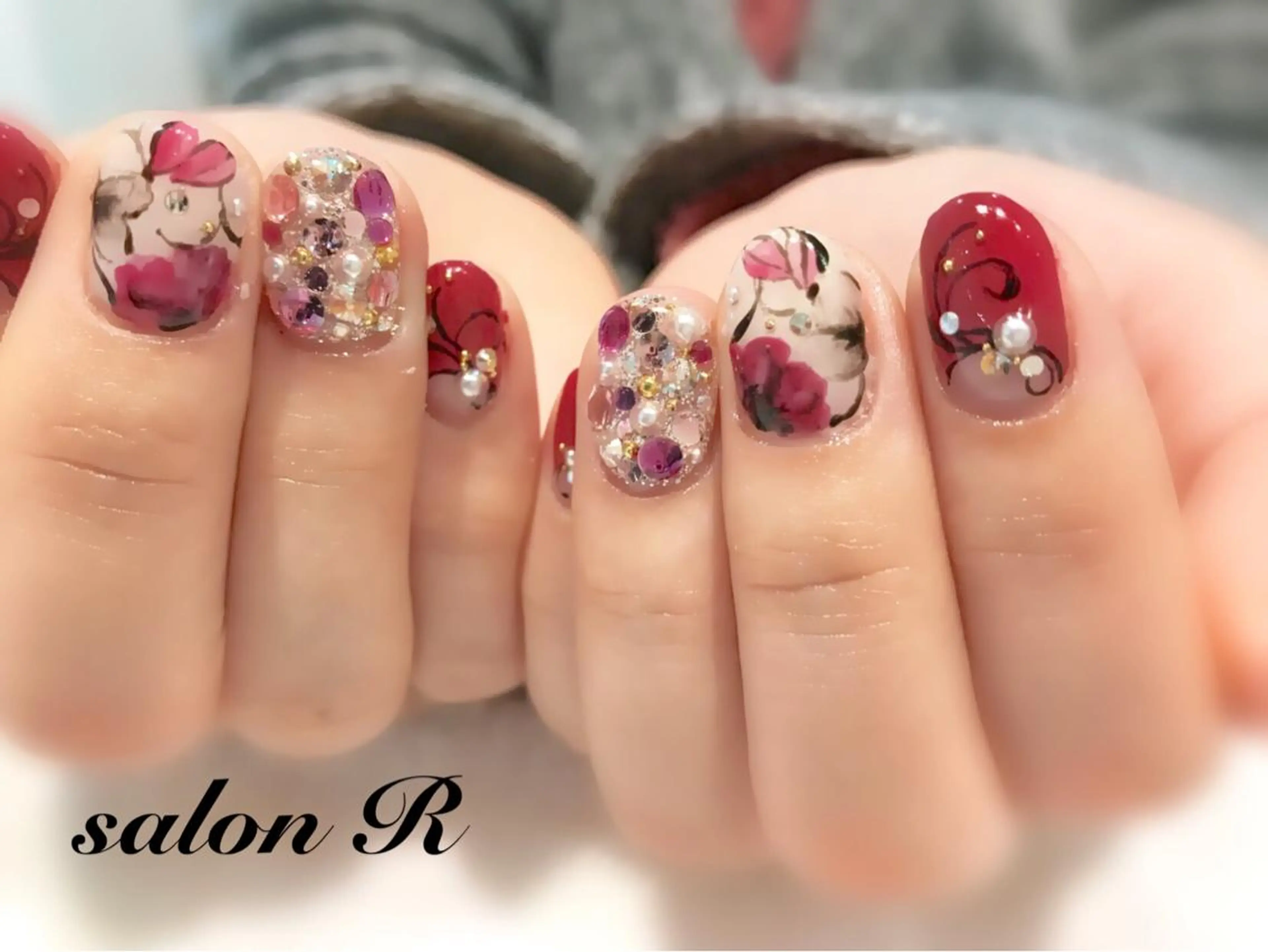 ネイル フラワーネイル 赤色 ハンドネイル Re Pearl～コーディネートサロン～ 市駅前店所属・NARUMI HYODOのネイルデザイン