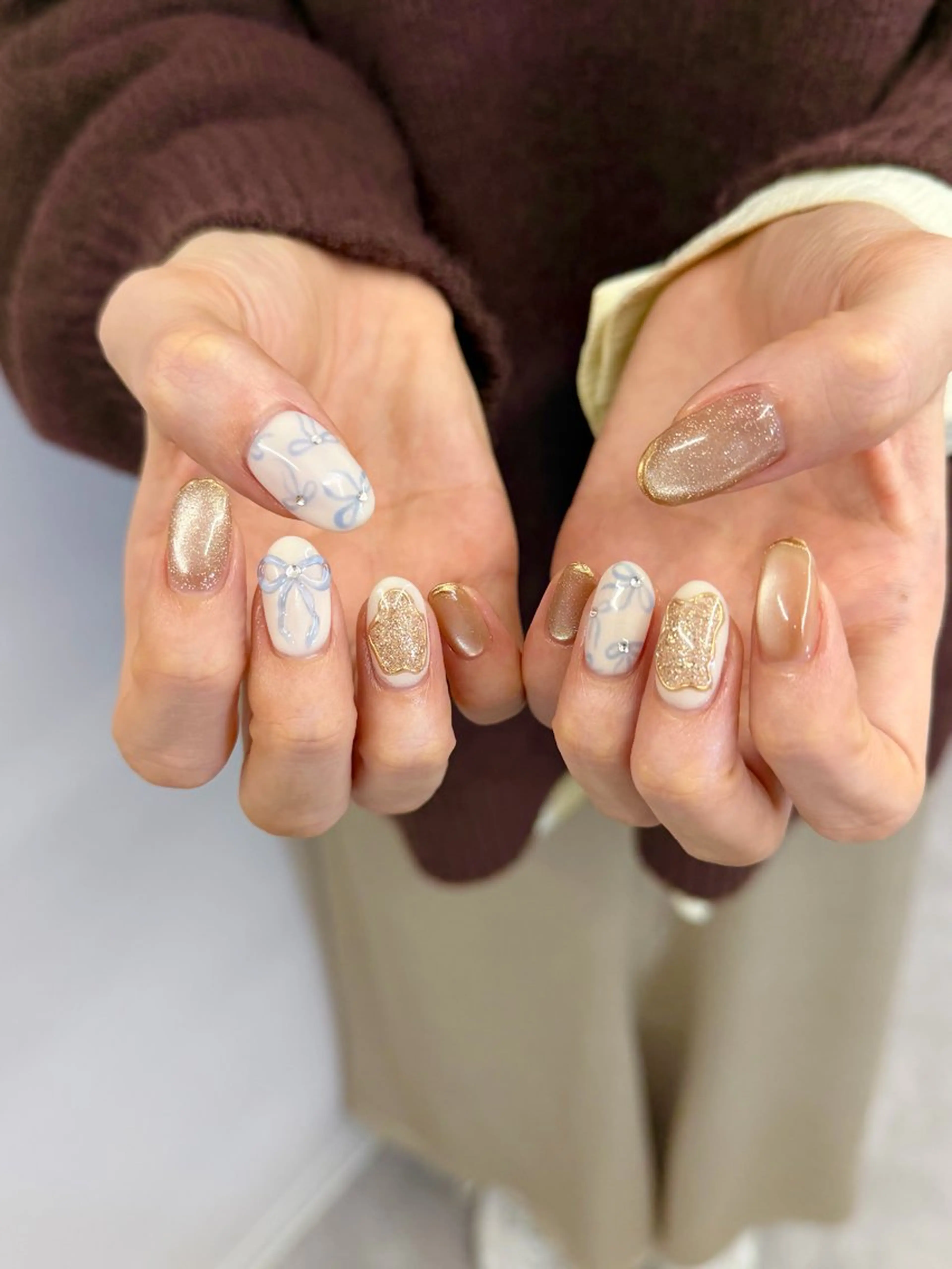 ネイル ジェルネイル ゴールド キラキラネイル マグネットネイル ニュアンスネイル Bana_ Nailのネイルデザイン