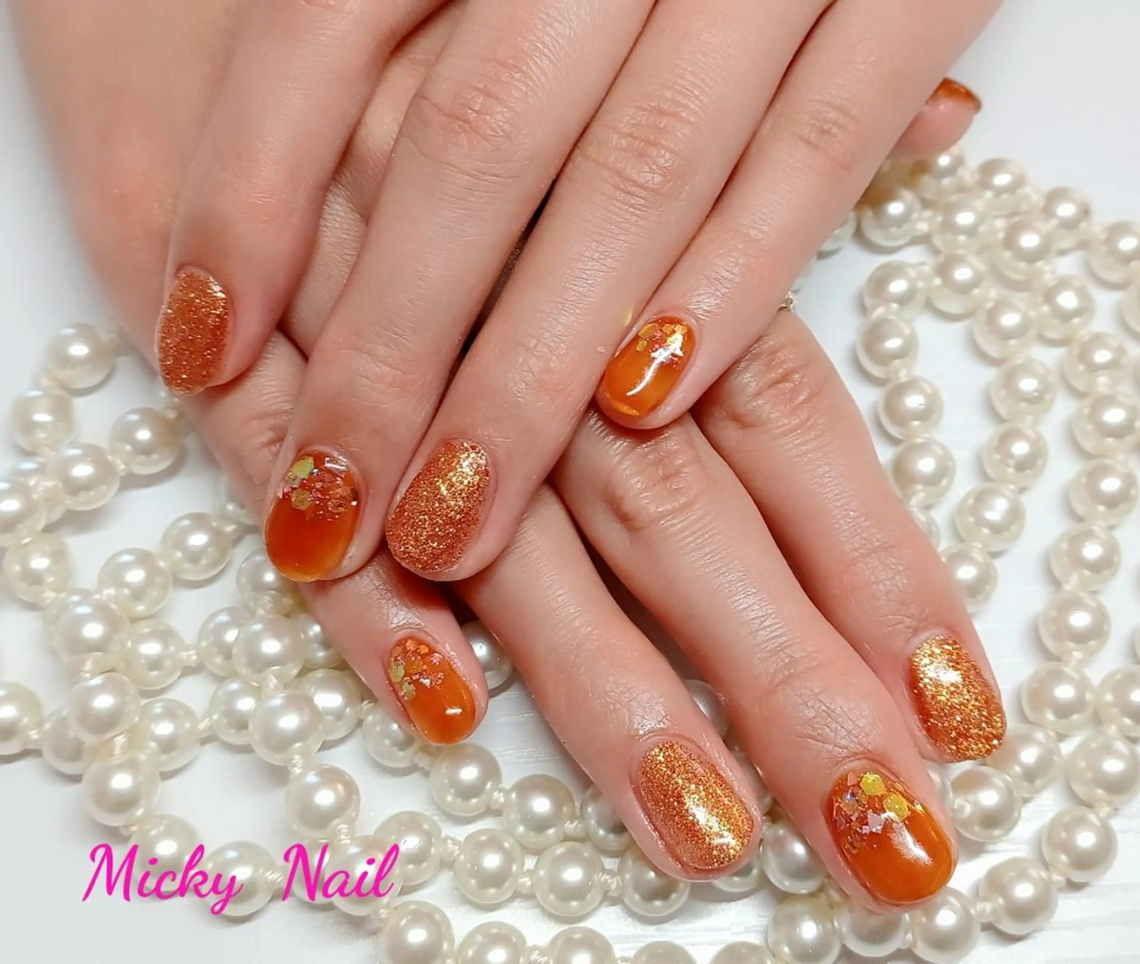 ネイル キラキラネイル オレンジ Micky nail chikushinoのネイルデザイン