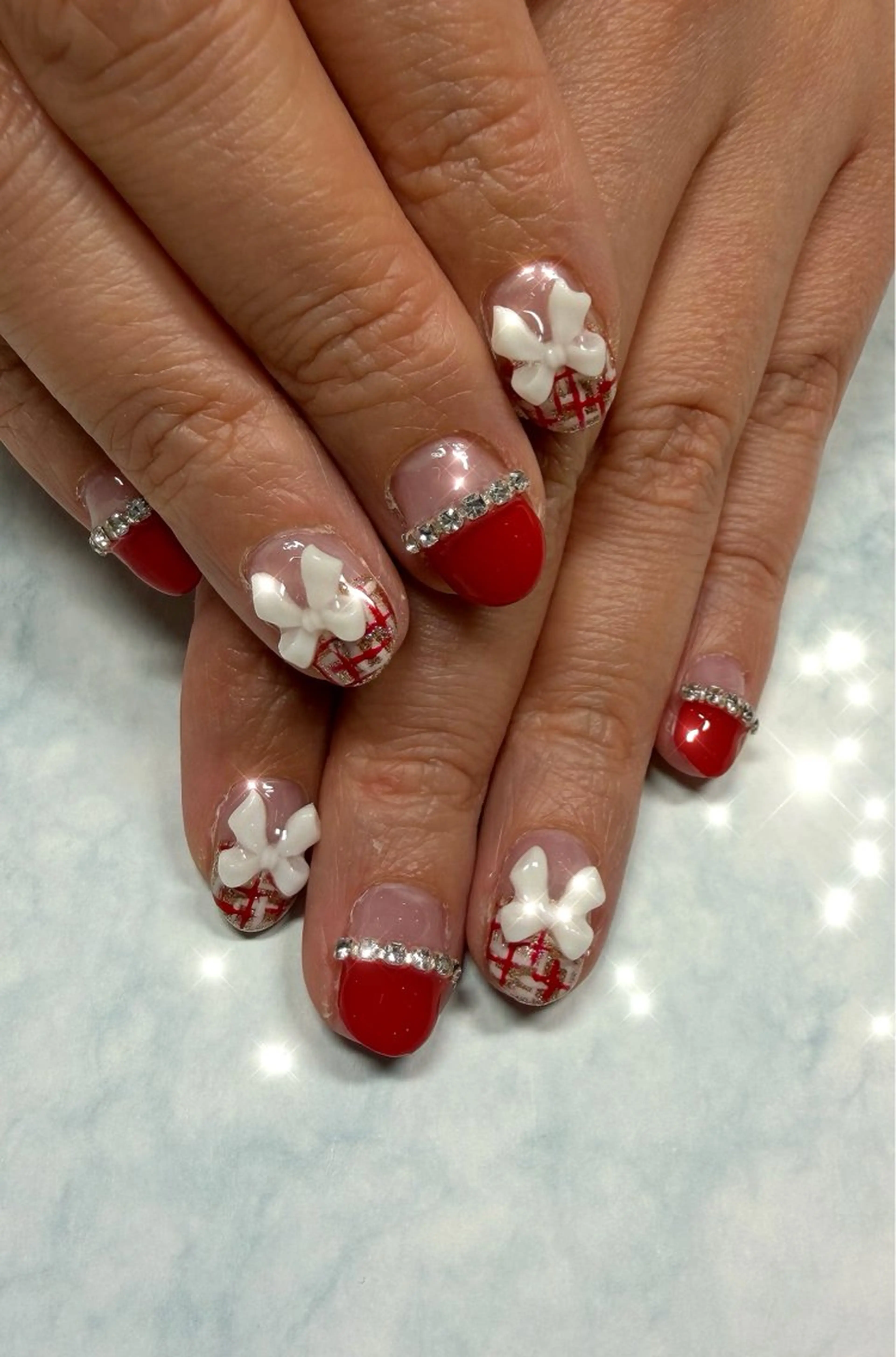 ネイル 赤色 リボン ツイードネイル 冬ネイル クリスマス ハンドネイル colors荻窪所属・colors 荻窪のネイルデザイン