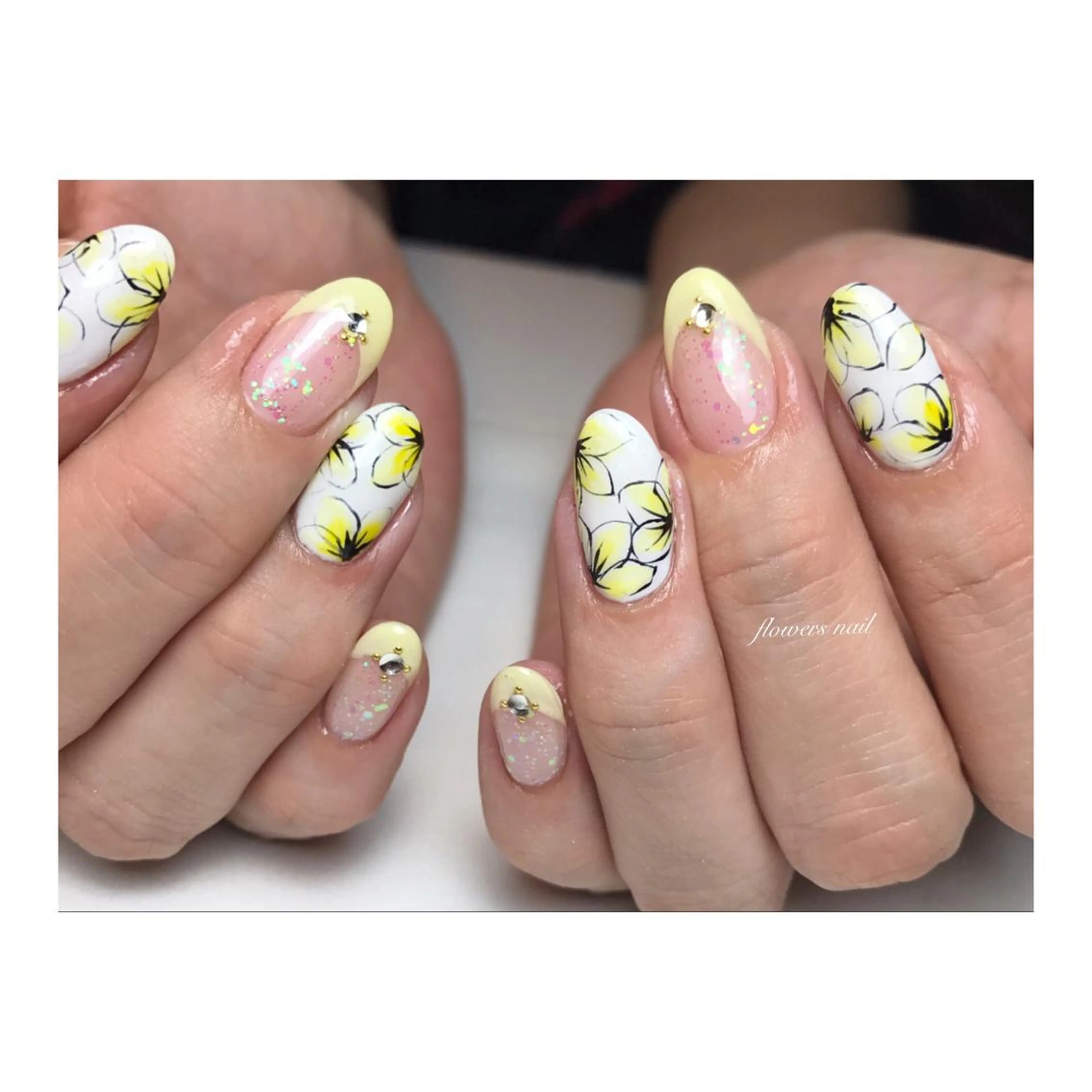ネイル パステルネイル 春ネイル 黄色 flowers nailのネイルデザイン