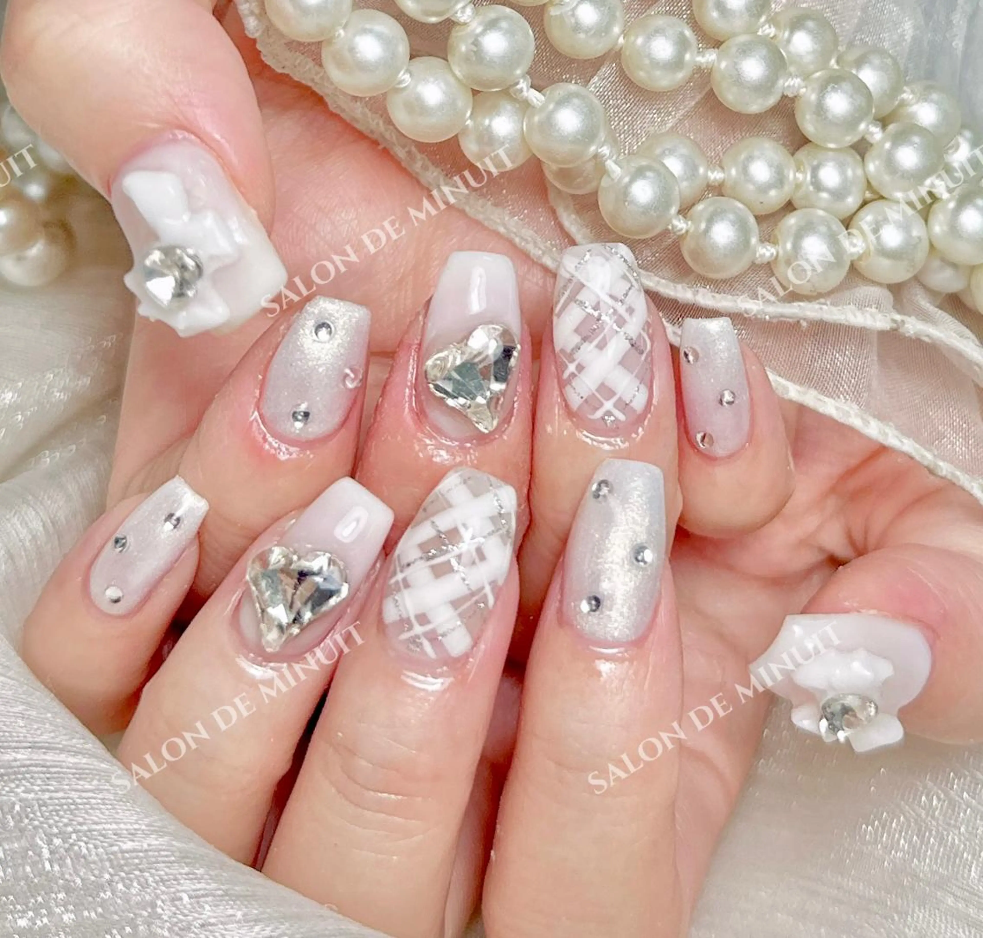 ネイル Salon de Minuit🦩のネイルデザイン