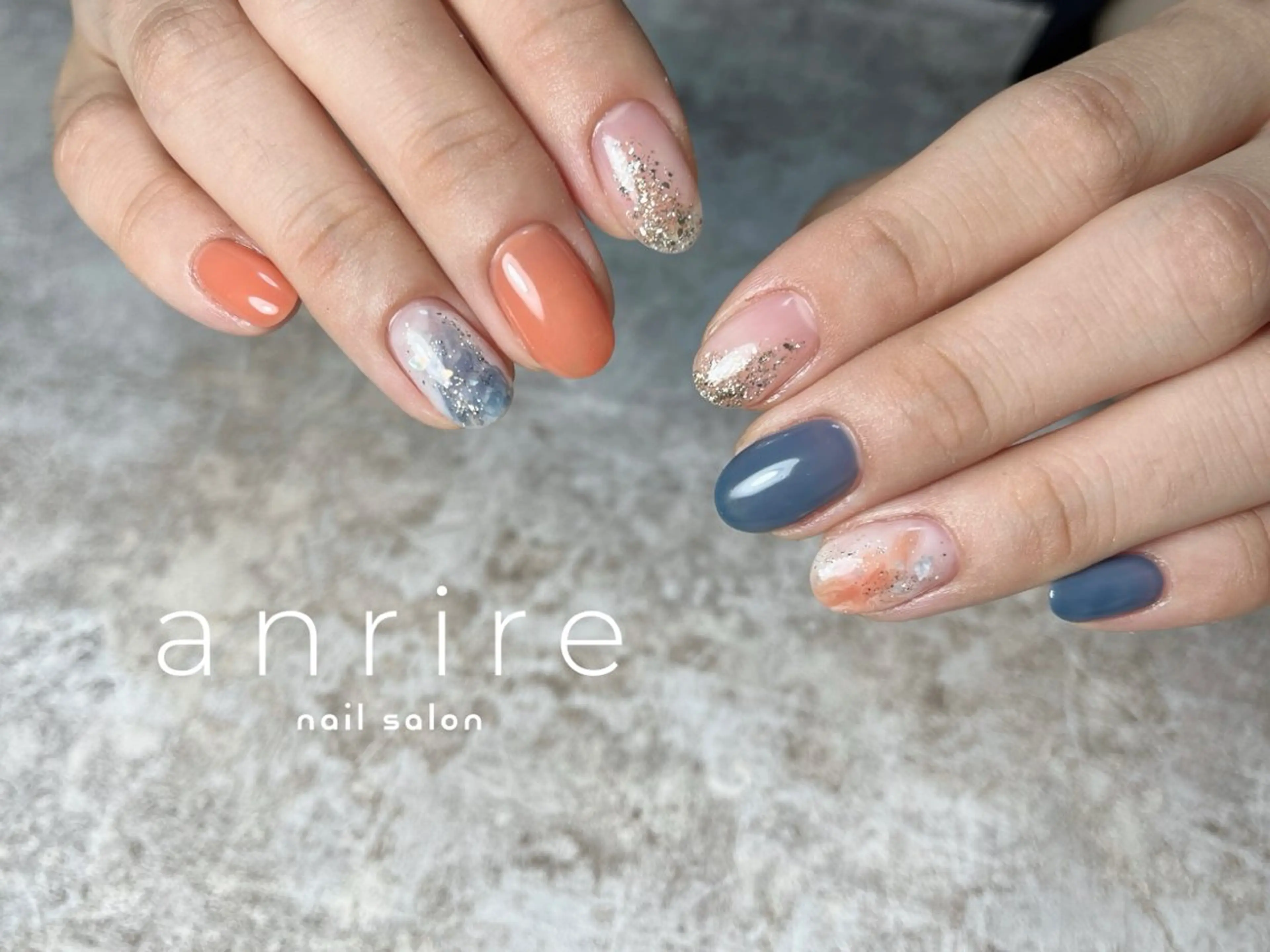 ネイル ブルー ラメ(グリッター) ネイビー ニュアンスネイル オレンジ nail salon anrire〜アンリール〜所属・nailsalon anrireのネイルデザイン