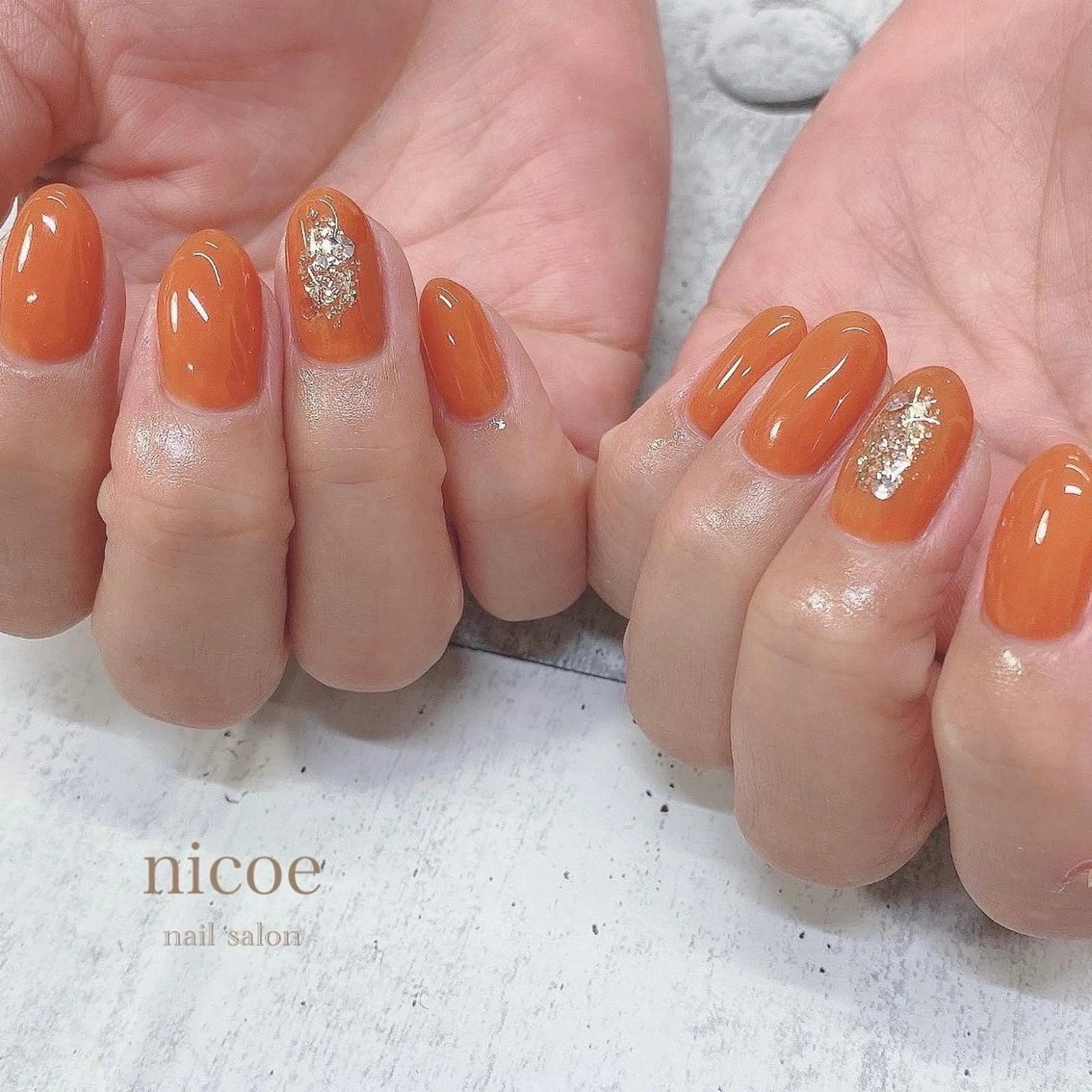 ネイル アートネイル フラワーネイル オフィスネイル ワンカラーネイル オレンジ ネイルサロン　nicoe【ニコエ】所属・ネイルサロン nicoeのネイルデザイン