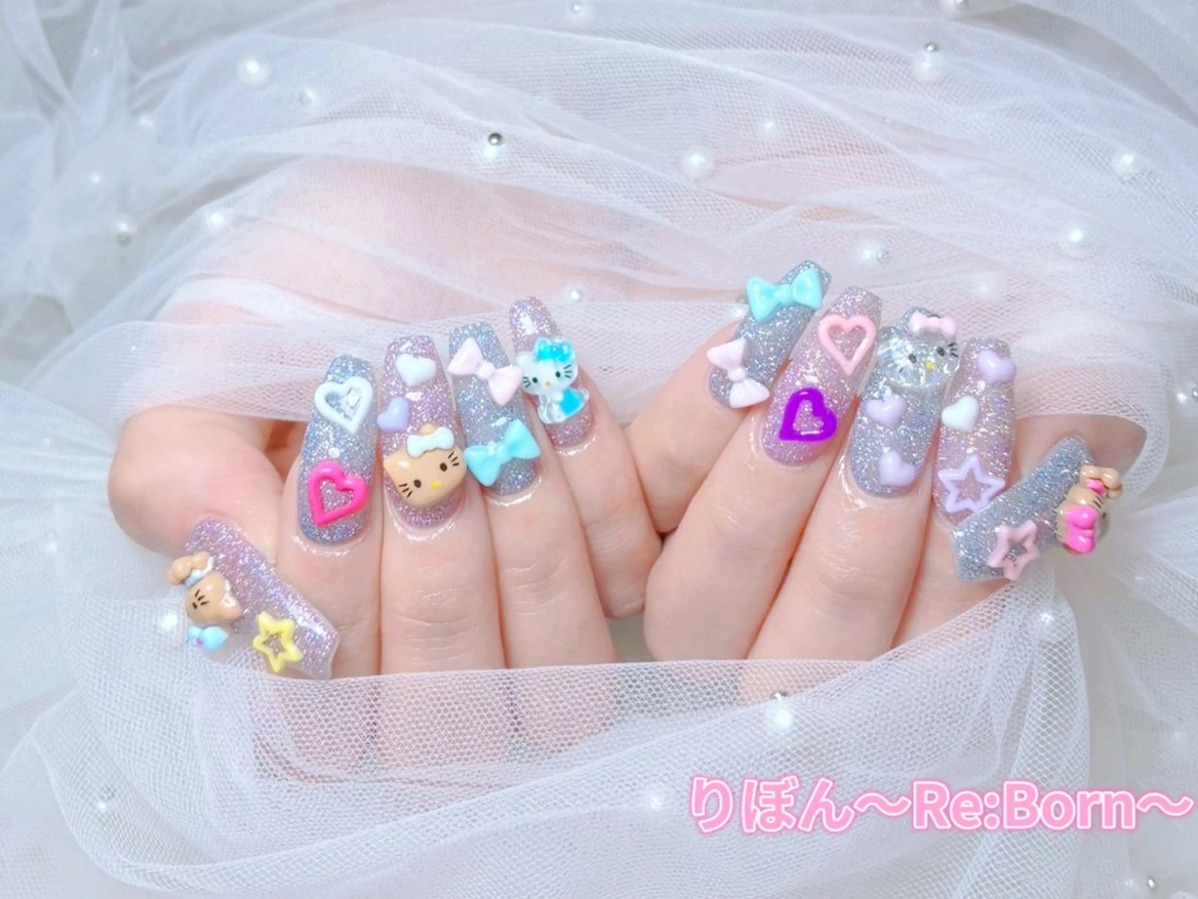 ミディアム ハンドネイル りぼん Re:Bonrのネイルデザイン