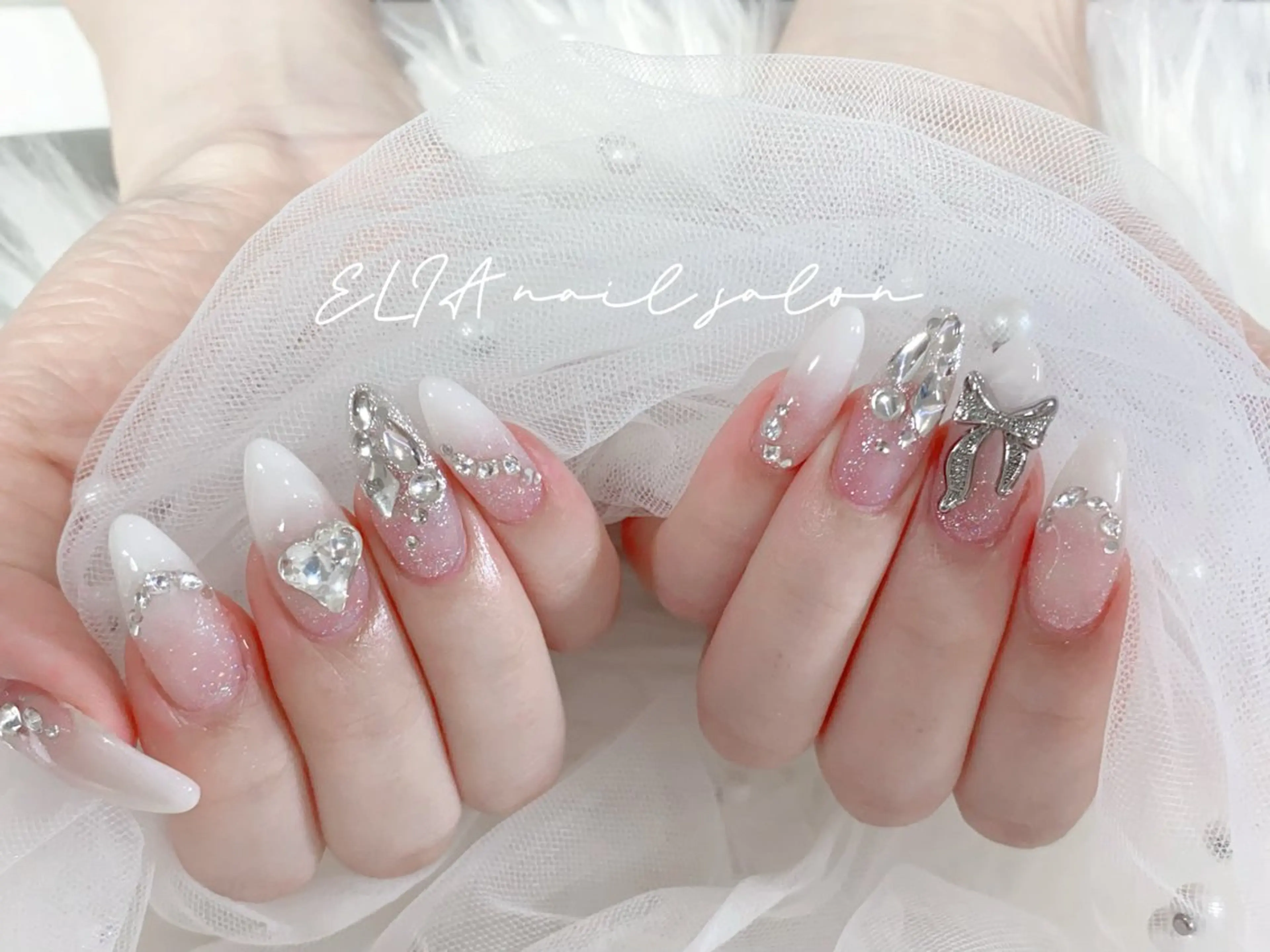 ネイル チークネイル 長さ出し グラデーション ラメ(グリッター) ラメグラデーション ハンドネイル ELIA【エリア】 nailsalonのネイルデザイン