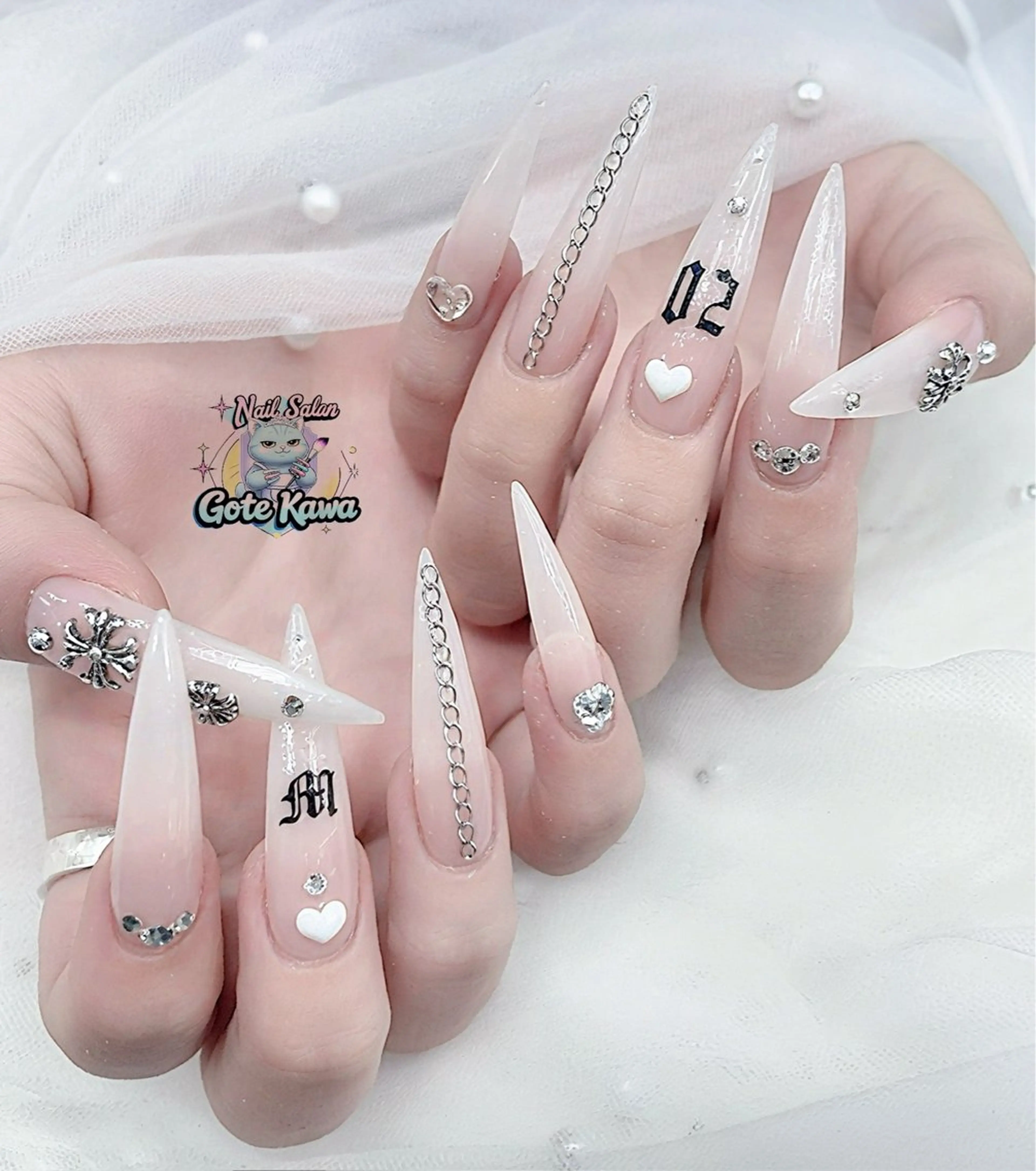 ネイル アートネイル 長さ出し キラキラネイル ピンク リボン ハンドネイル ハンドケア GOTE KAWA Nail Salon(ゴテかわ)所属・Gote Kawa nail salonのネイルデザイン