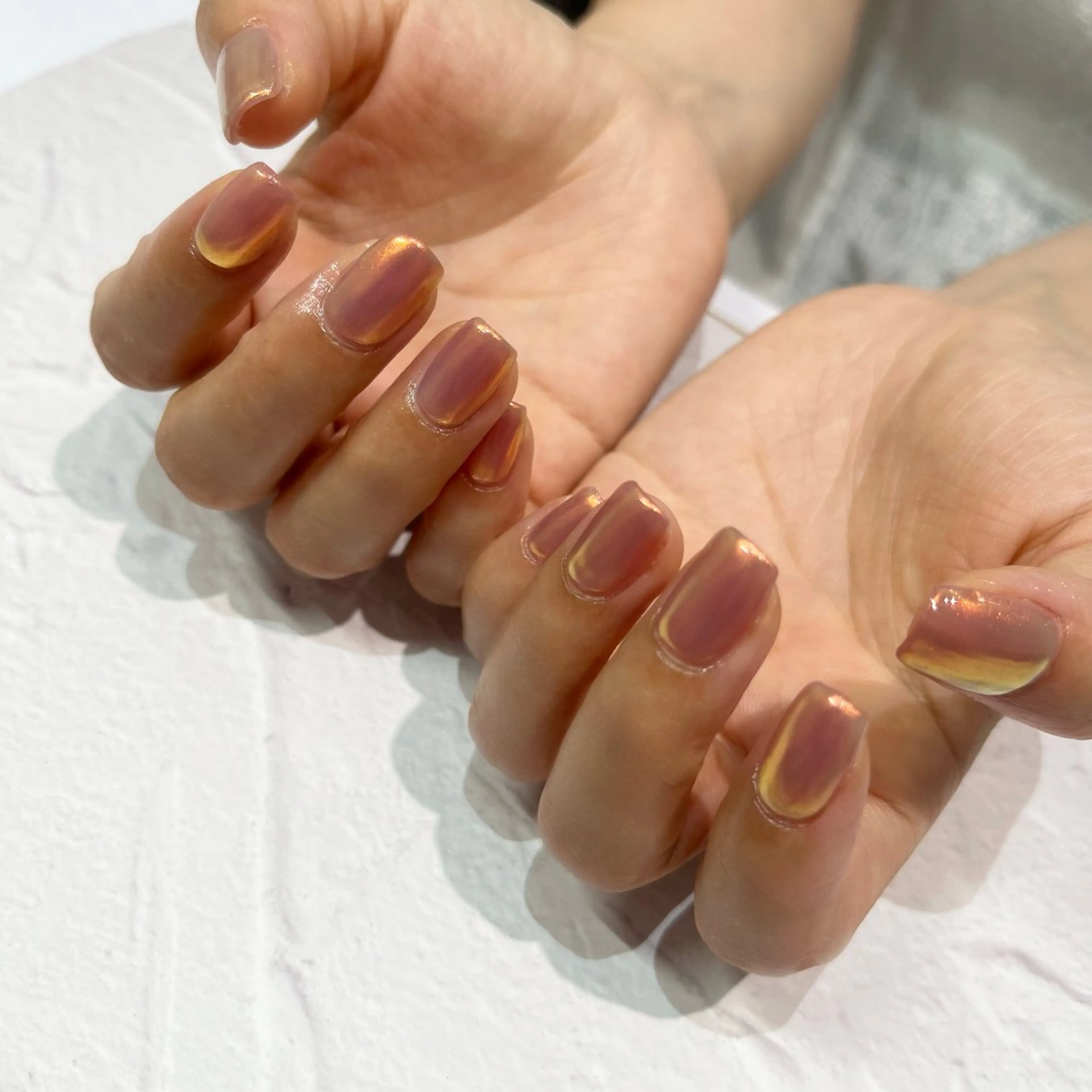 ネイル オーロラネイル ワンカラーネイル オレンジ ピンク nail&care salon soa所属・soa/美容液ケアで 自爪を育てるネイルのネイルデザイン