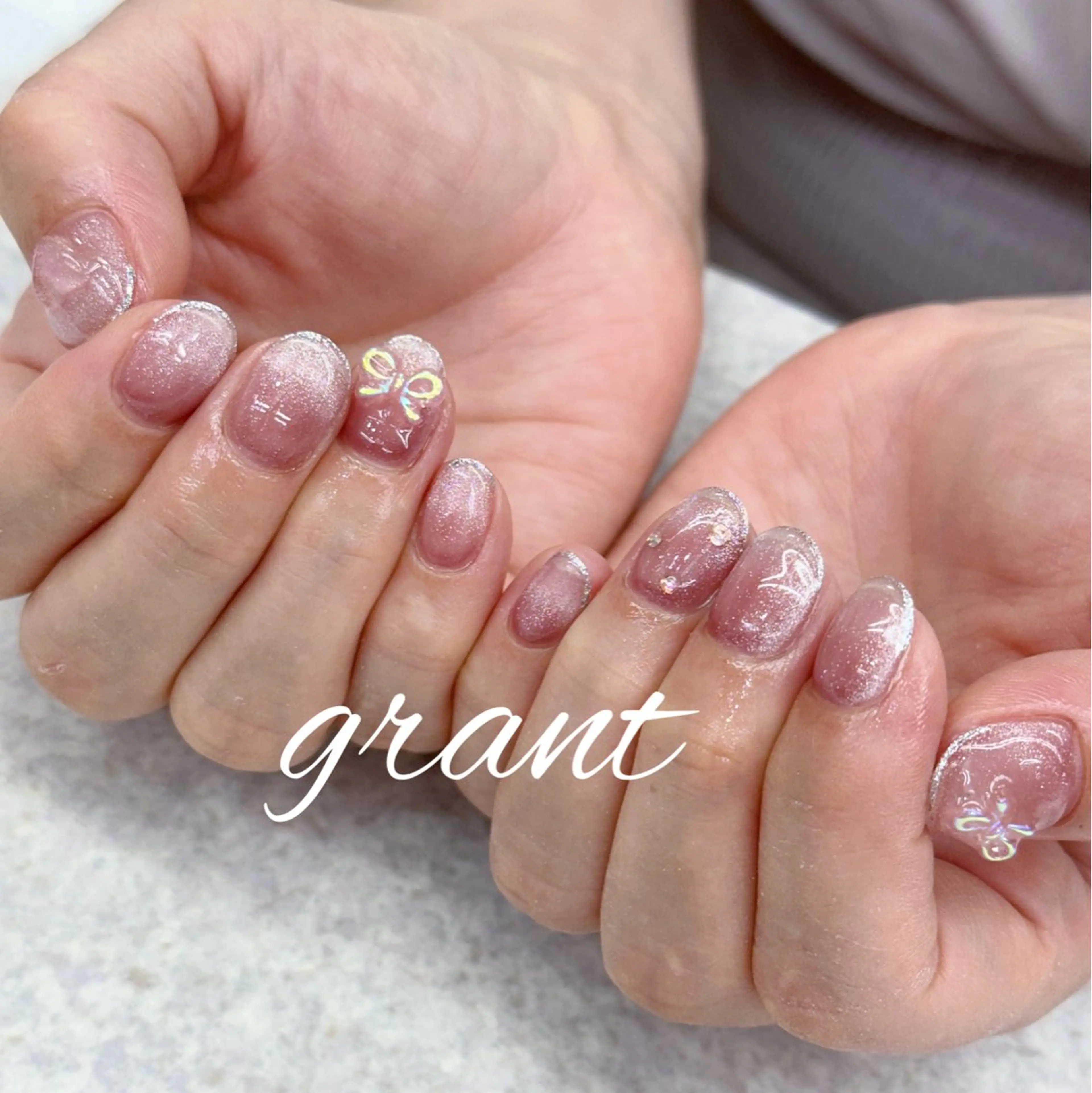 ネイル マグネットネイル リボン ハンドネイル nail salon grant所属・nailsalon grantのネイルデザイン