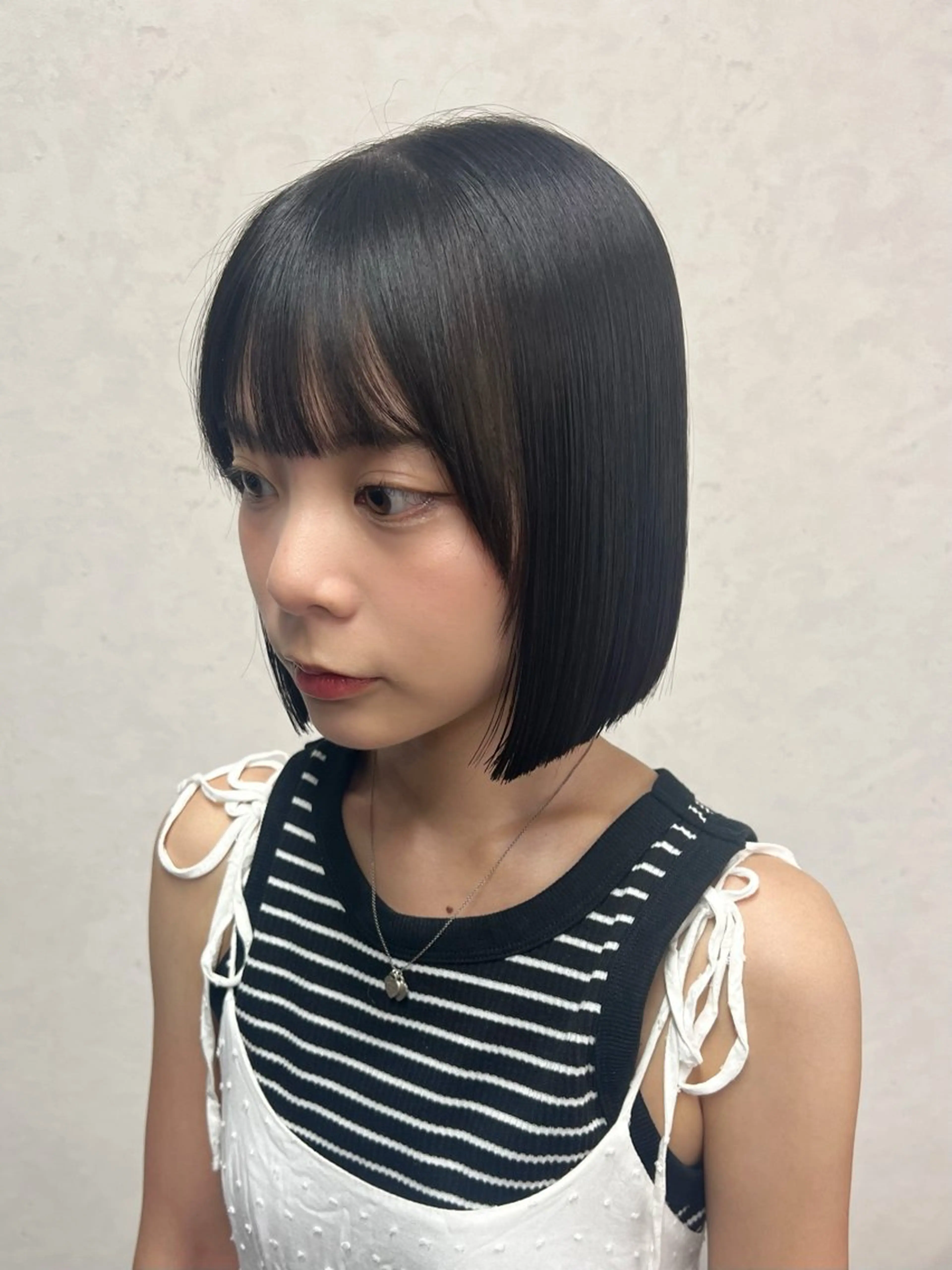 【夏休み学生限定♡⃛🦋.*˚𓂃 𓈒𓏸】黒染めを使わないブラックカラー➕トリートメント➕超音波アイロンケアの写真