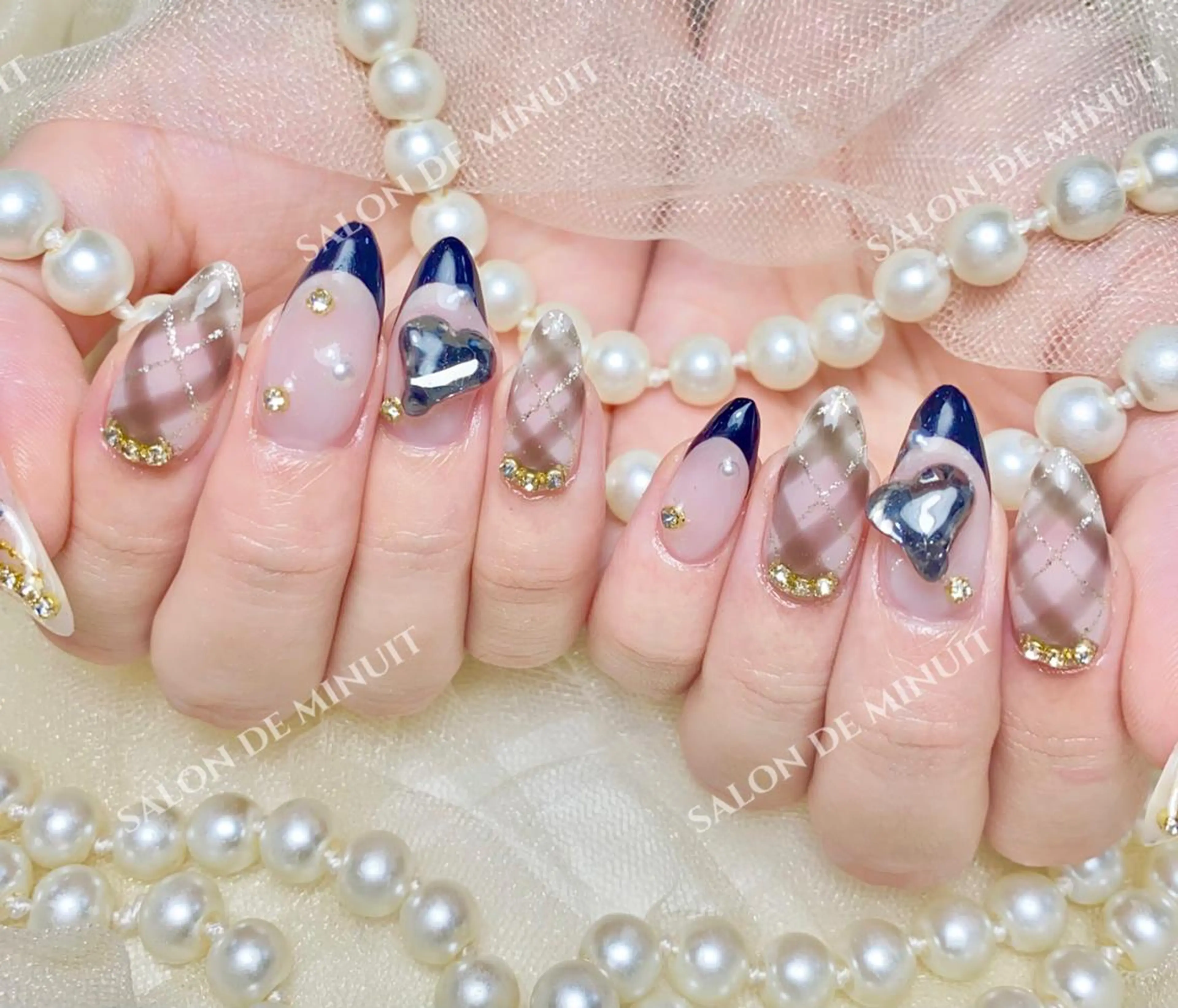 ネイル Salon de Minuit🦩のネイルデザイン