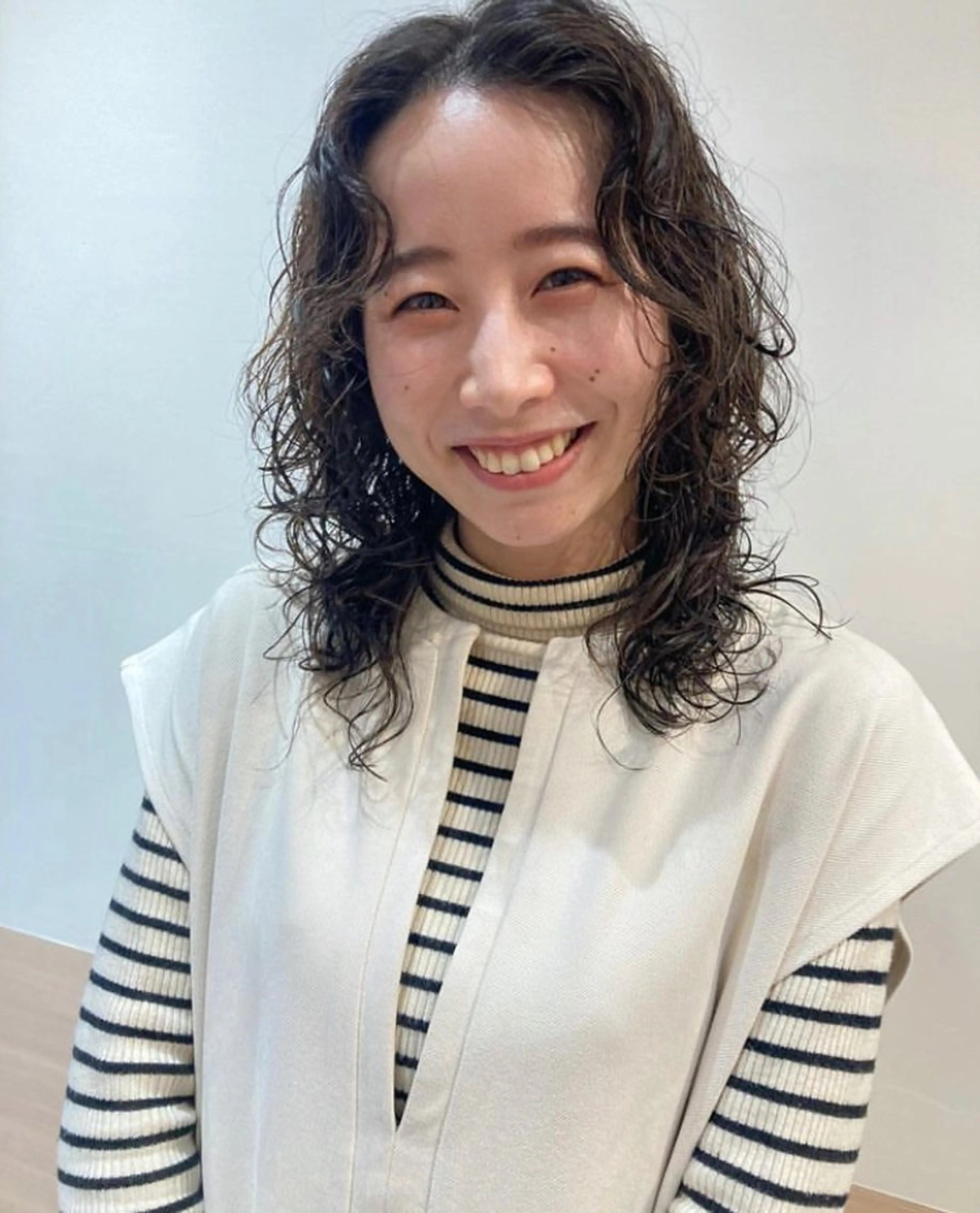 セミロング パーマ セミロングパーマ スパイラルパーマ カット パーマ icie所属・大阪ヴィーガンサロン KANAKOのヘアスタイル