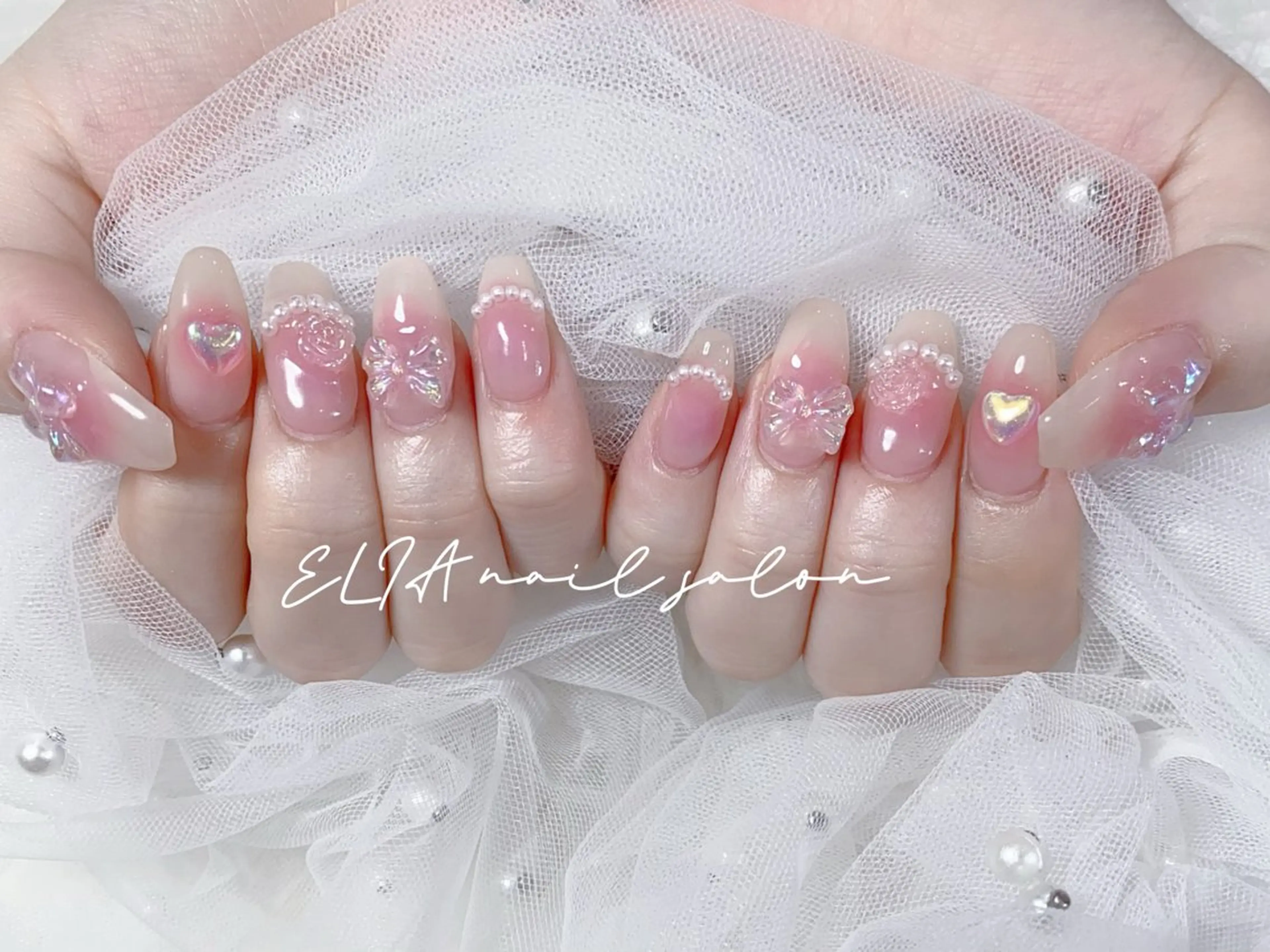 ネイル チークネイル 長さ出し グラデーション ラメ(グリッター) ラメグラデーション ハンドネイル ELIA【エリア】 nailsalonのネイルデザイン