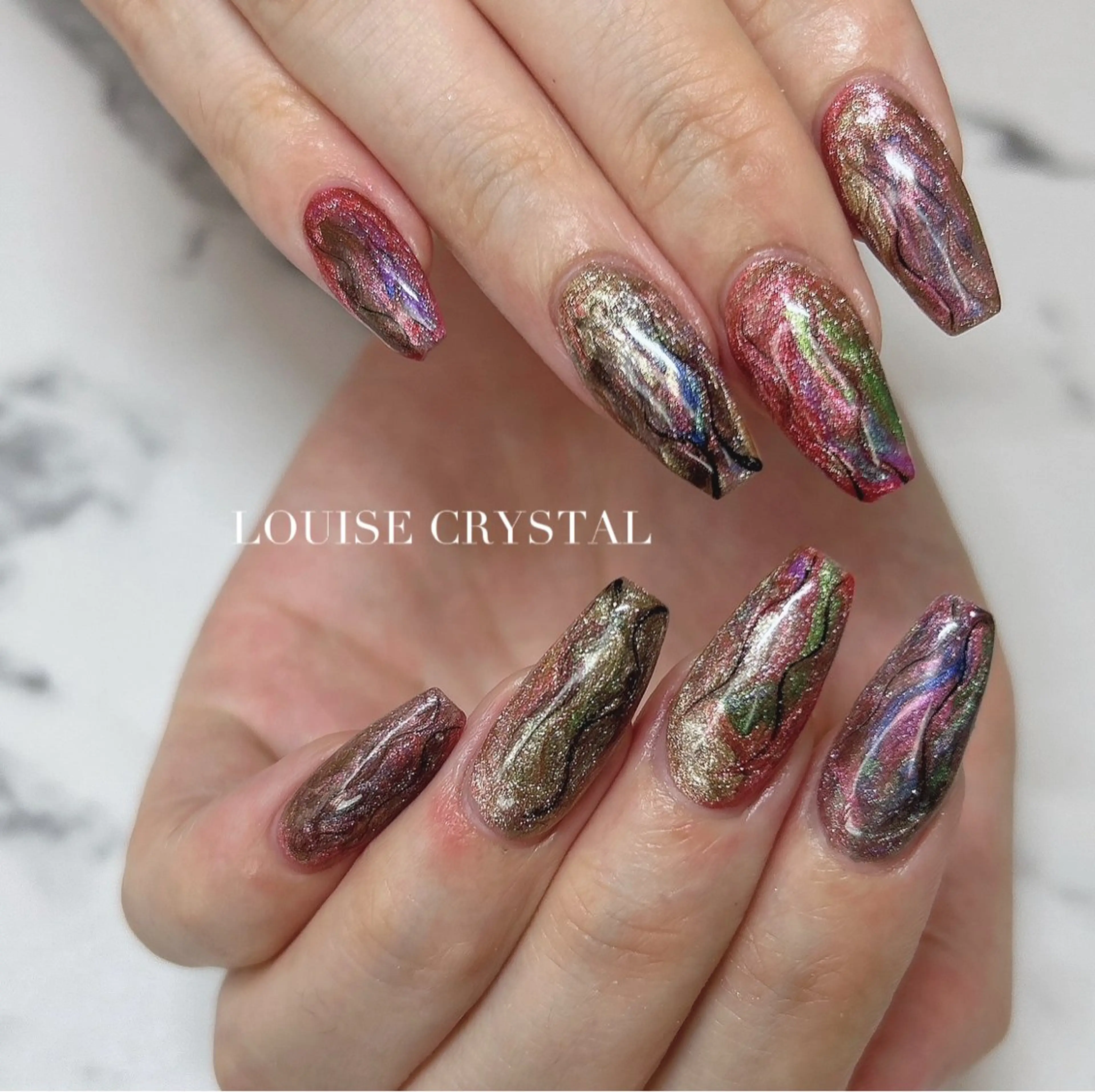 ネイル ハンドネイル LOUISE CRYSTALのネイルデザイン
