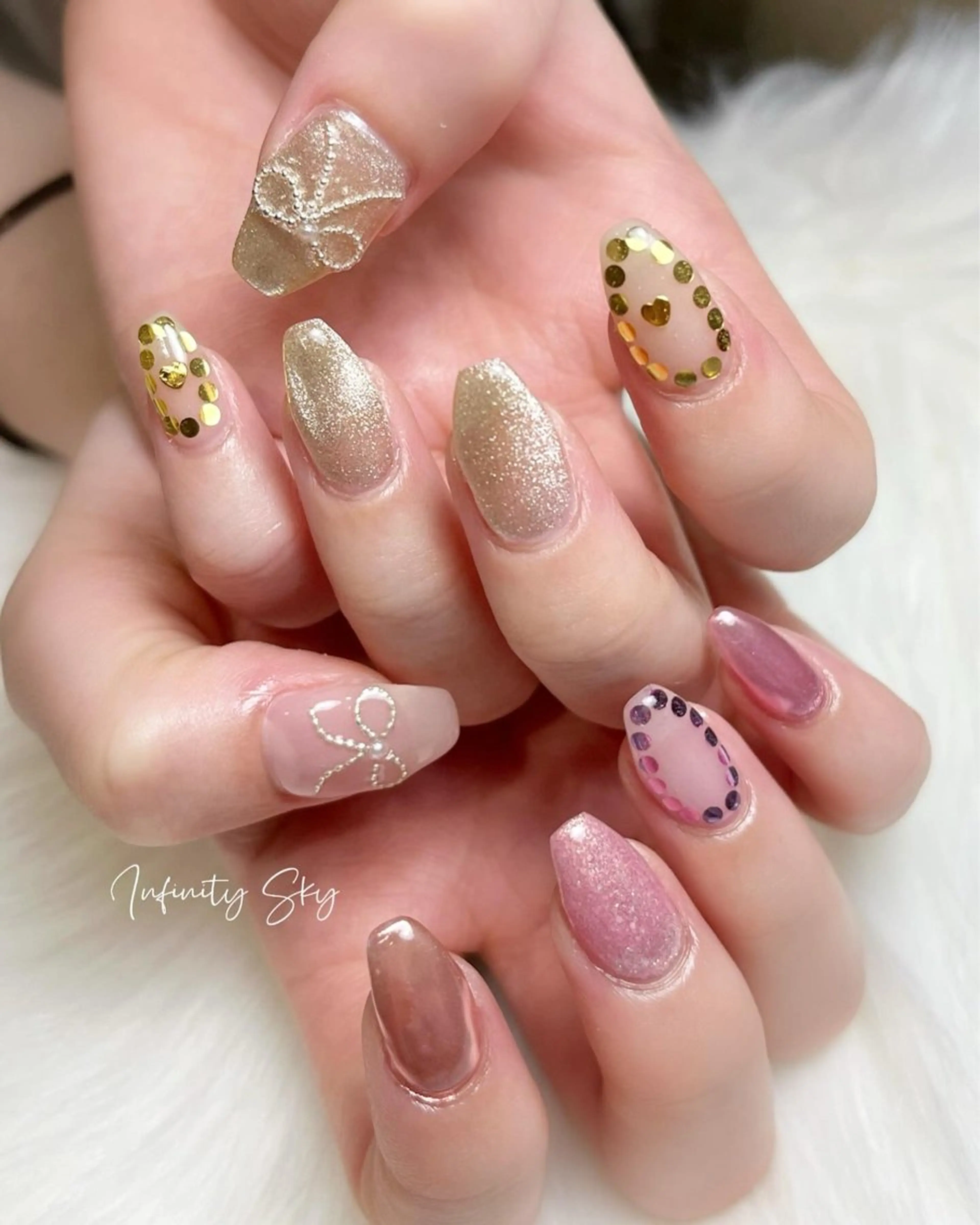 ネイル リボン infinity skyのネイルデザイン