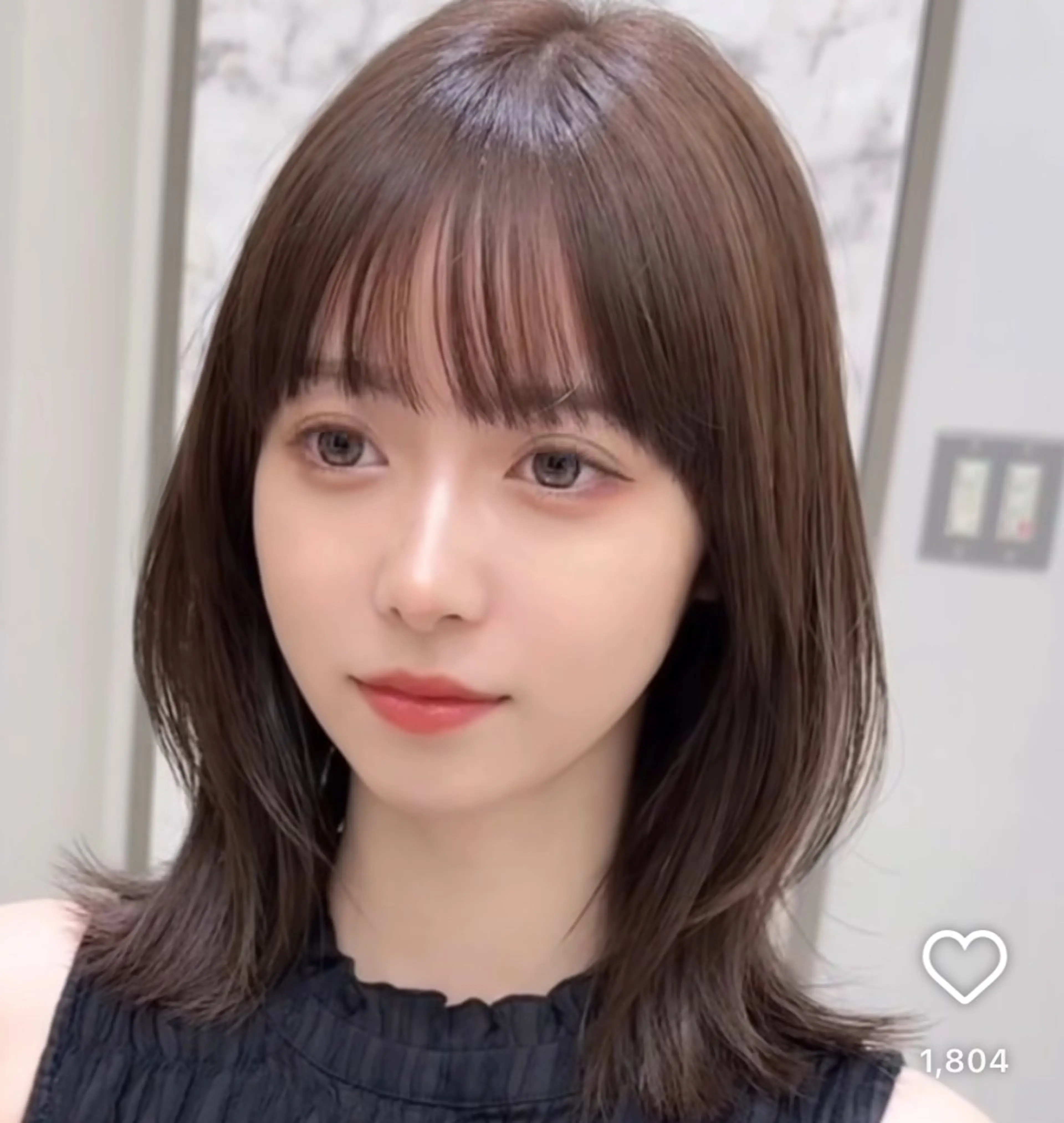 コテ巻き風パーマの写真