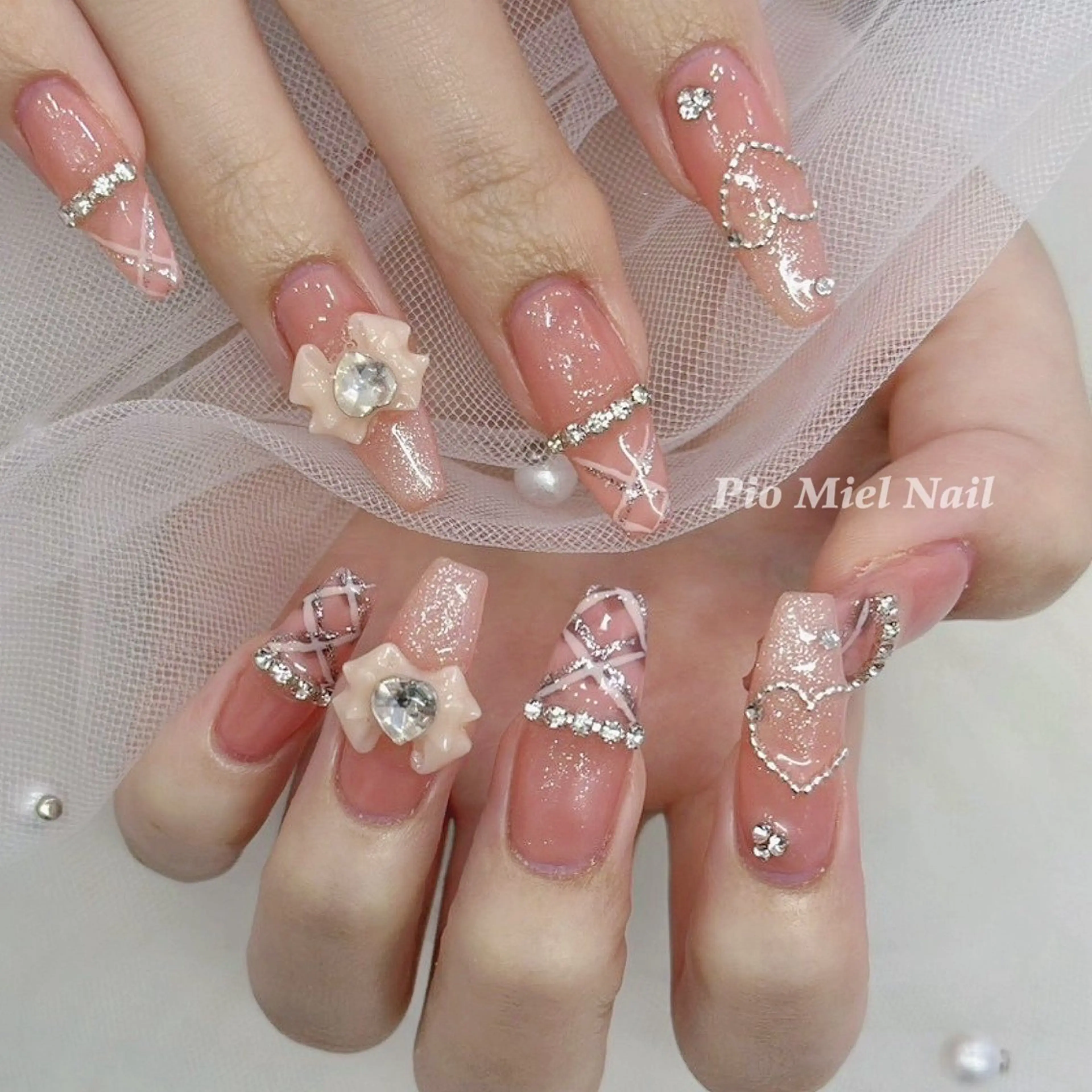 ネイル 長さ出し ジェルネイル ガーリー ハート キラキラネイル ハンドネイル momo 長さだしのネイルデザイン