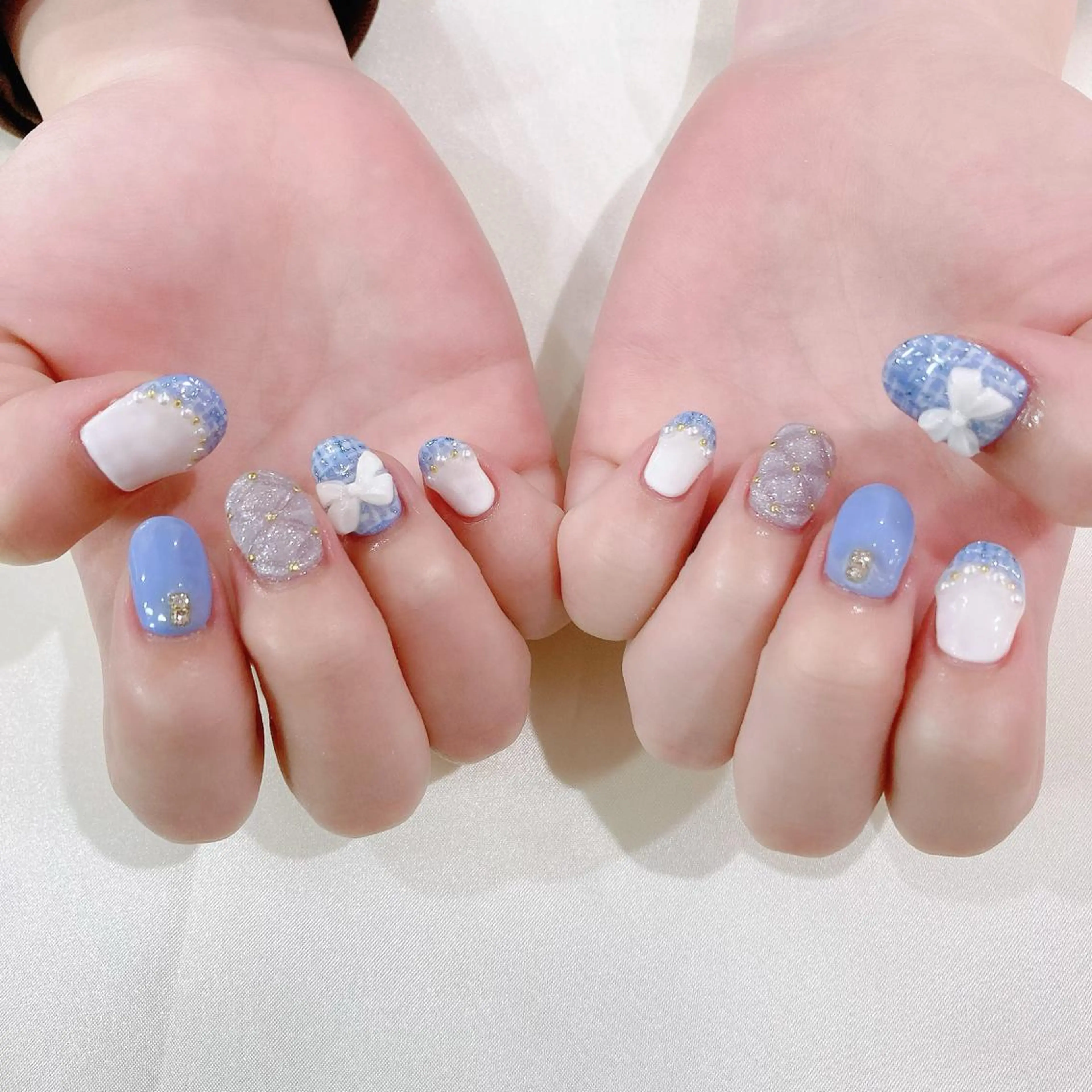 ネイル ブルー ジェルネイル キラキラネイル パラジェル リボン ハンドネイル Nail Kのネイルデザイン