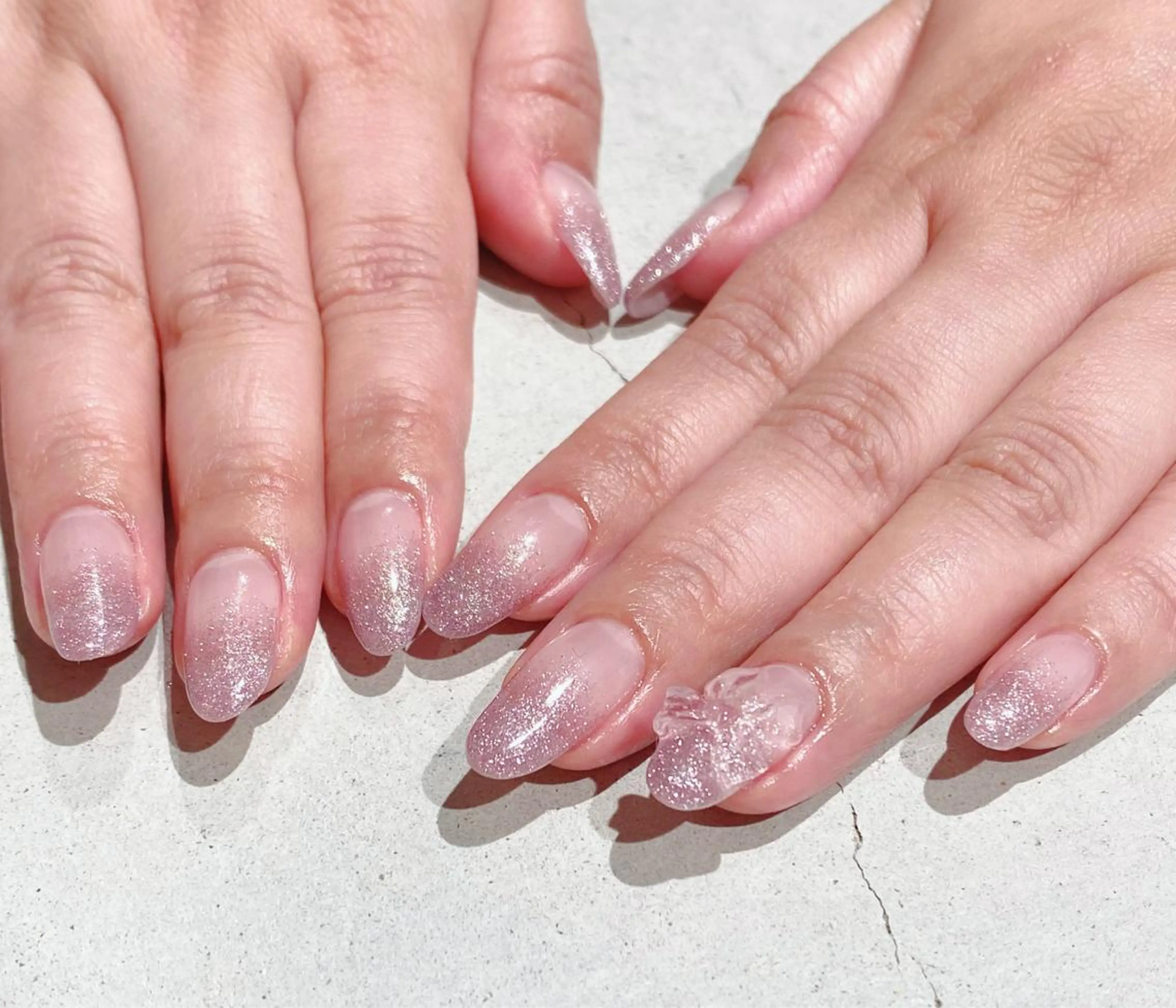 ネイル クリアネイル リボン Zir nail所属・zir nail💙 shikakuraのネイルデザイン
