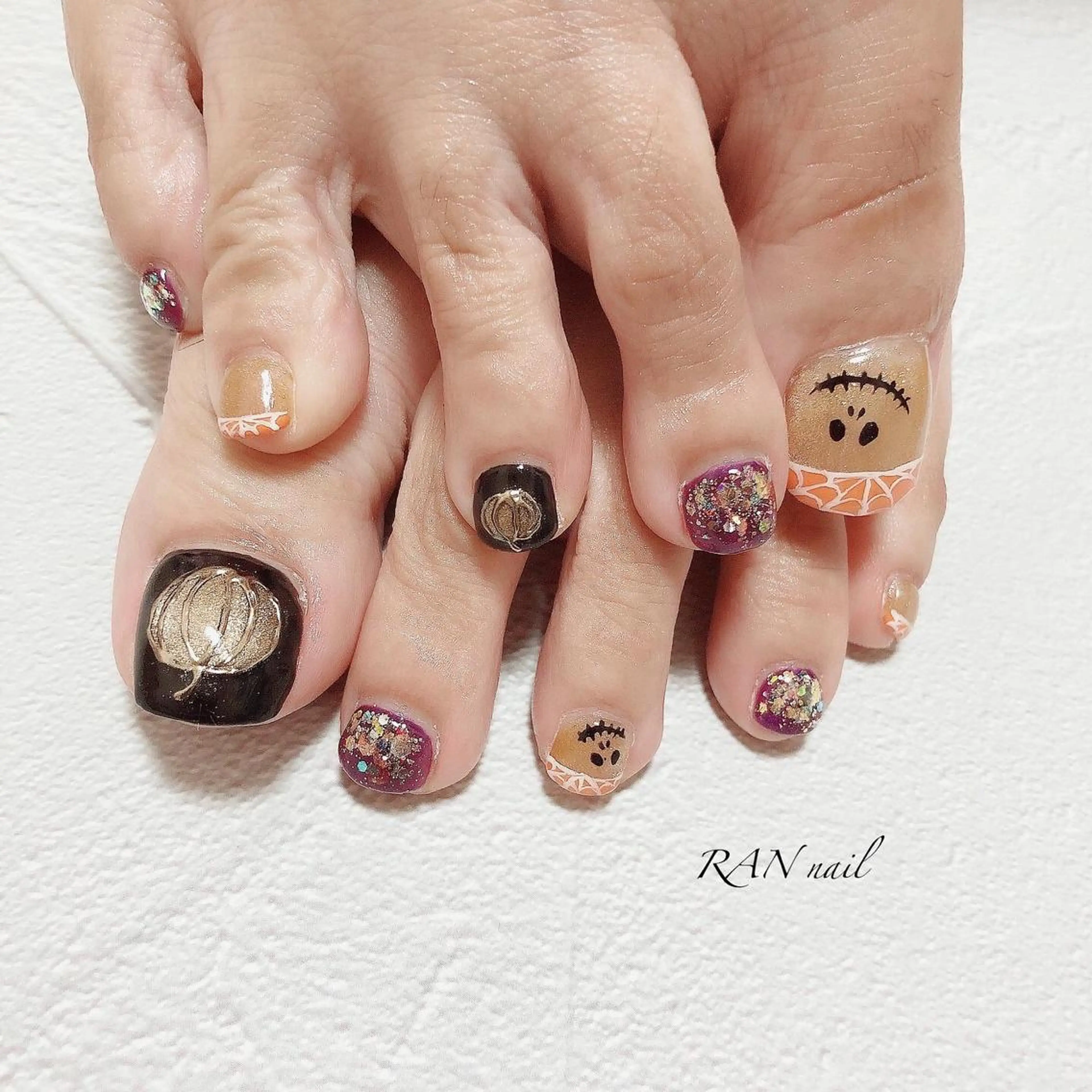 ネイル ジェルネイル ハロウィン キラキラネイル オフィスネイル オレンジ RAN nail 〜ランネイル〜所属・RAN nailのネイルデザイン