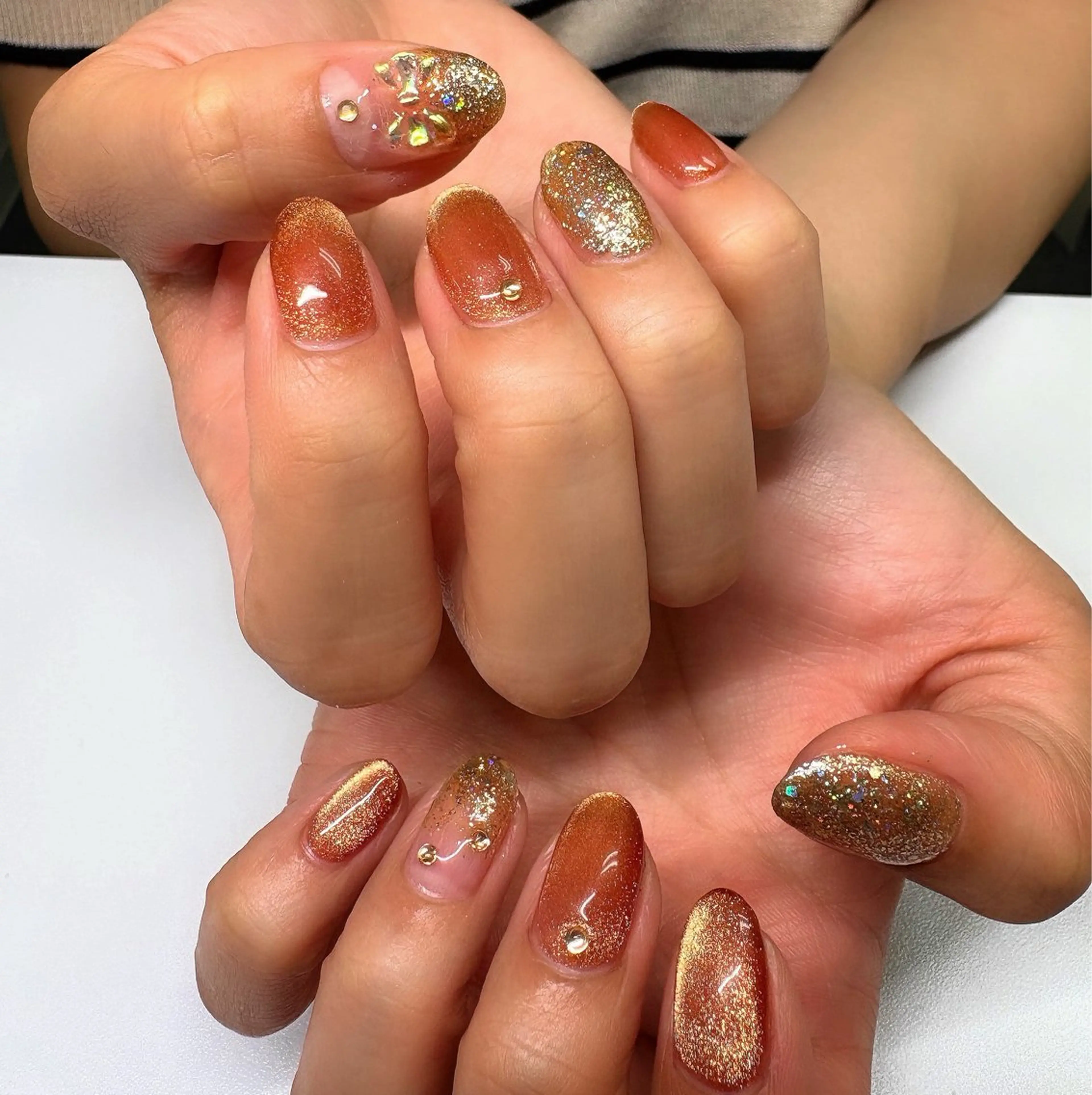 ネイル マグネットネイル オレンジ well nail所属・wellnail Nanakoのネイルデザイン