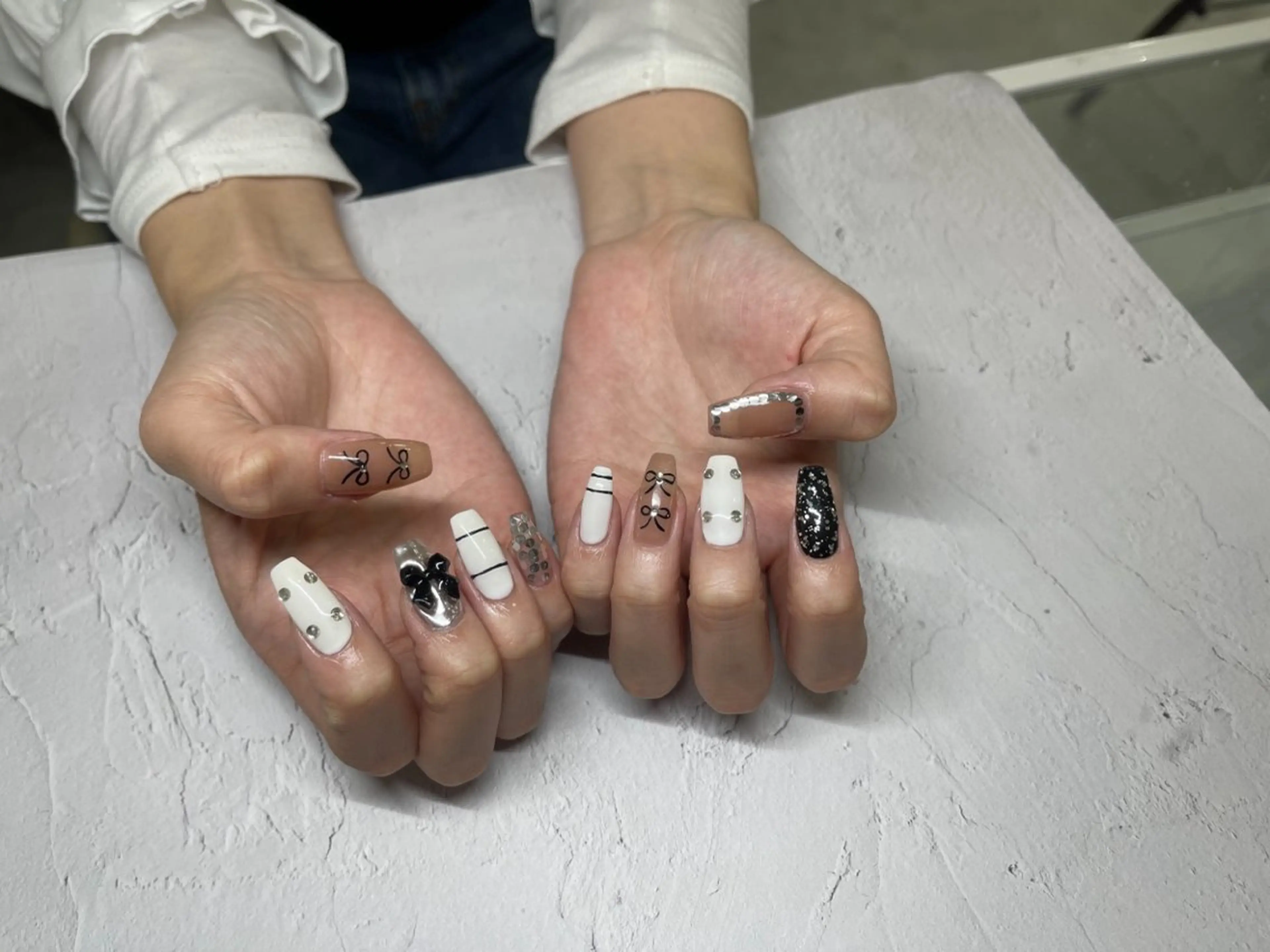 ネイル ハンドネイル フットネイル PEEKABOO京橋 EYE&NAILのマツエク・マツパデザイン
