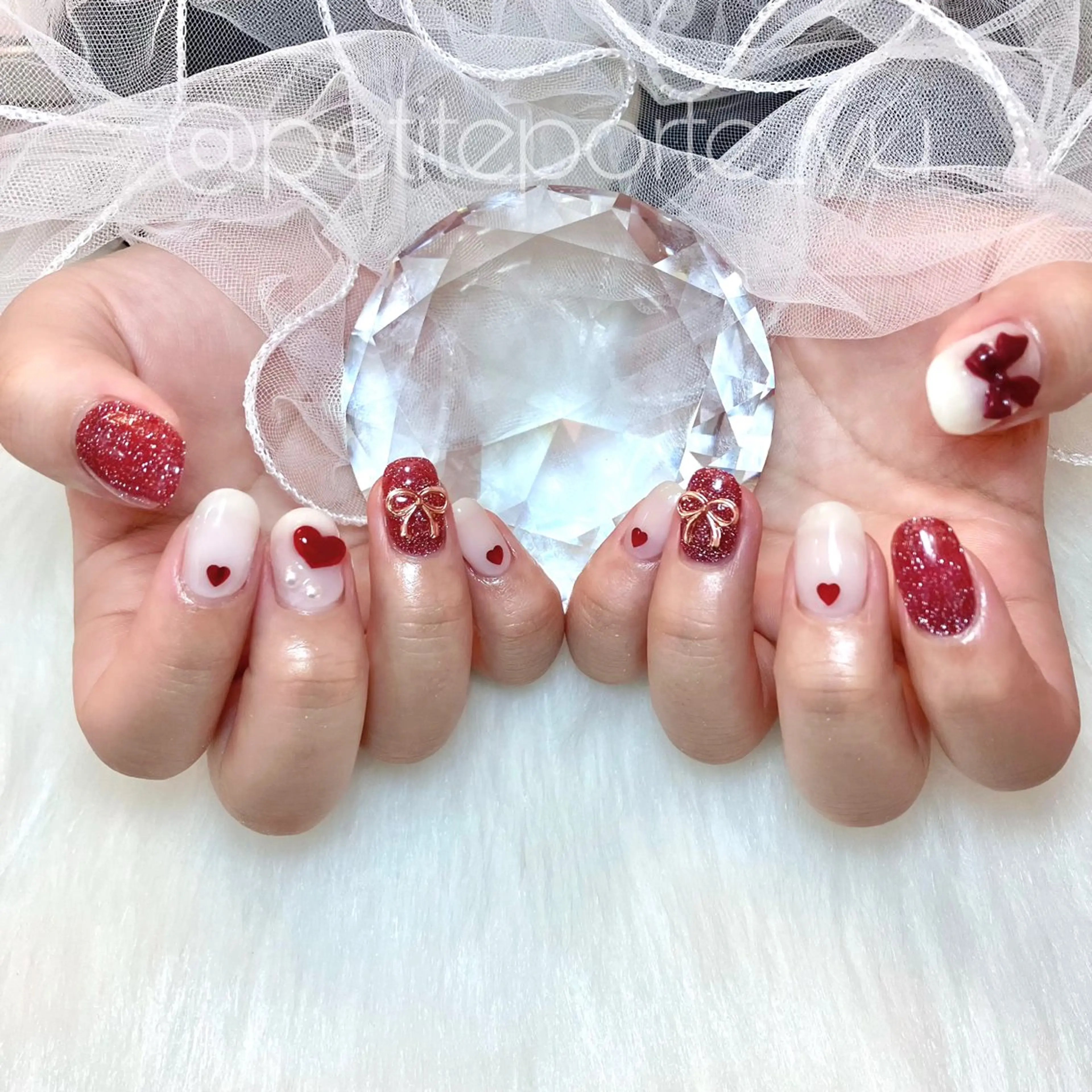 ネイル ガーリー ハート ワンカラーネイル リボン ハンドネイル nailsalon petite porte所属・petite porteのネイルデザイン