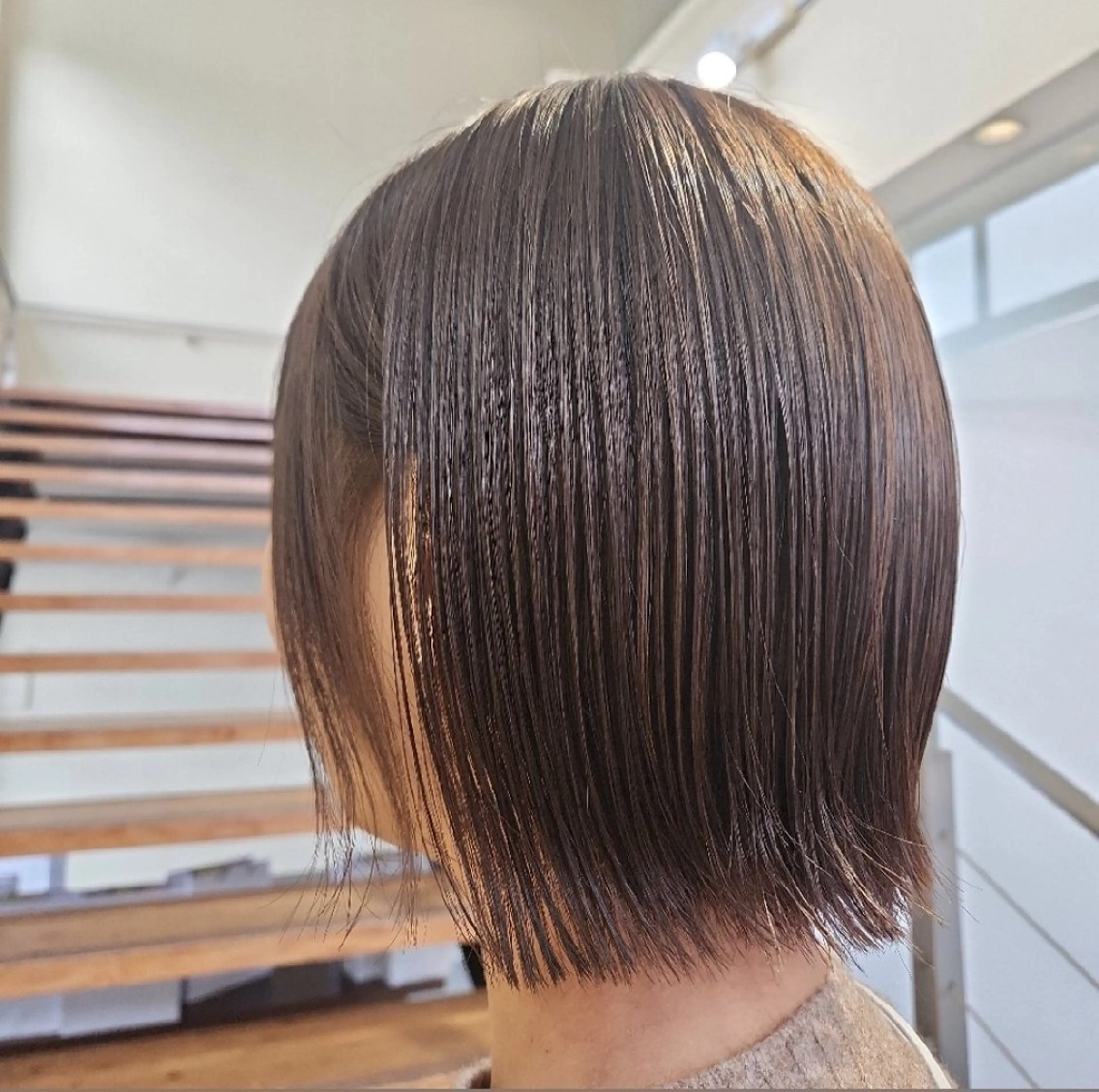 ぱっつんボブカット＋うる艶カラー＋髪質改善トリートメントの写真
