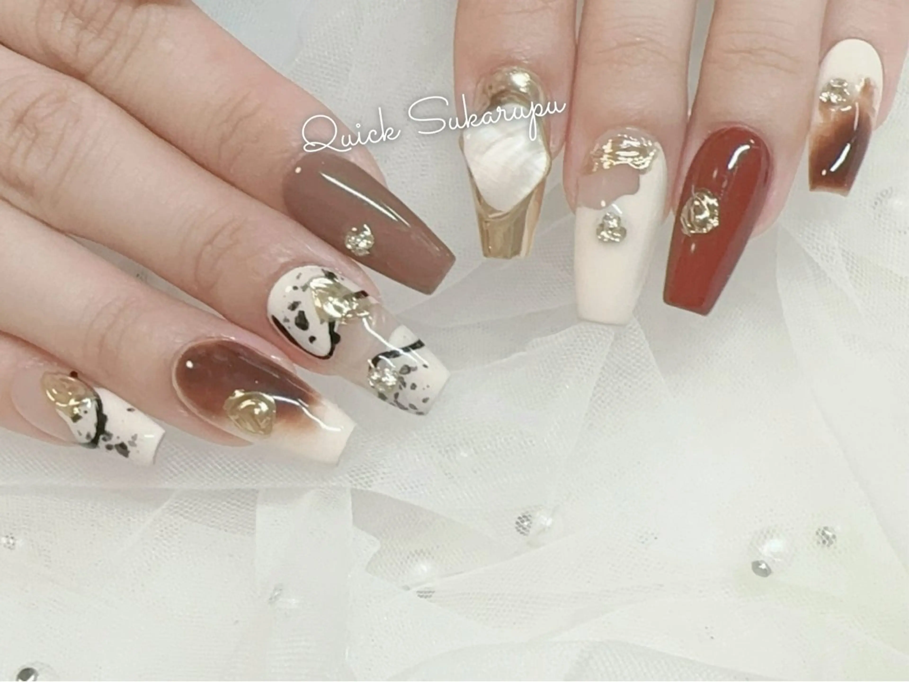 ロング ハンドネイル Quick Sukarupu 高田馬場店所属・Quick Sukarupuのネイルデザイン