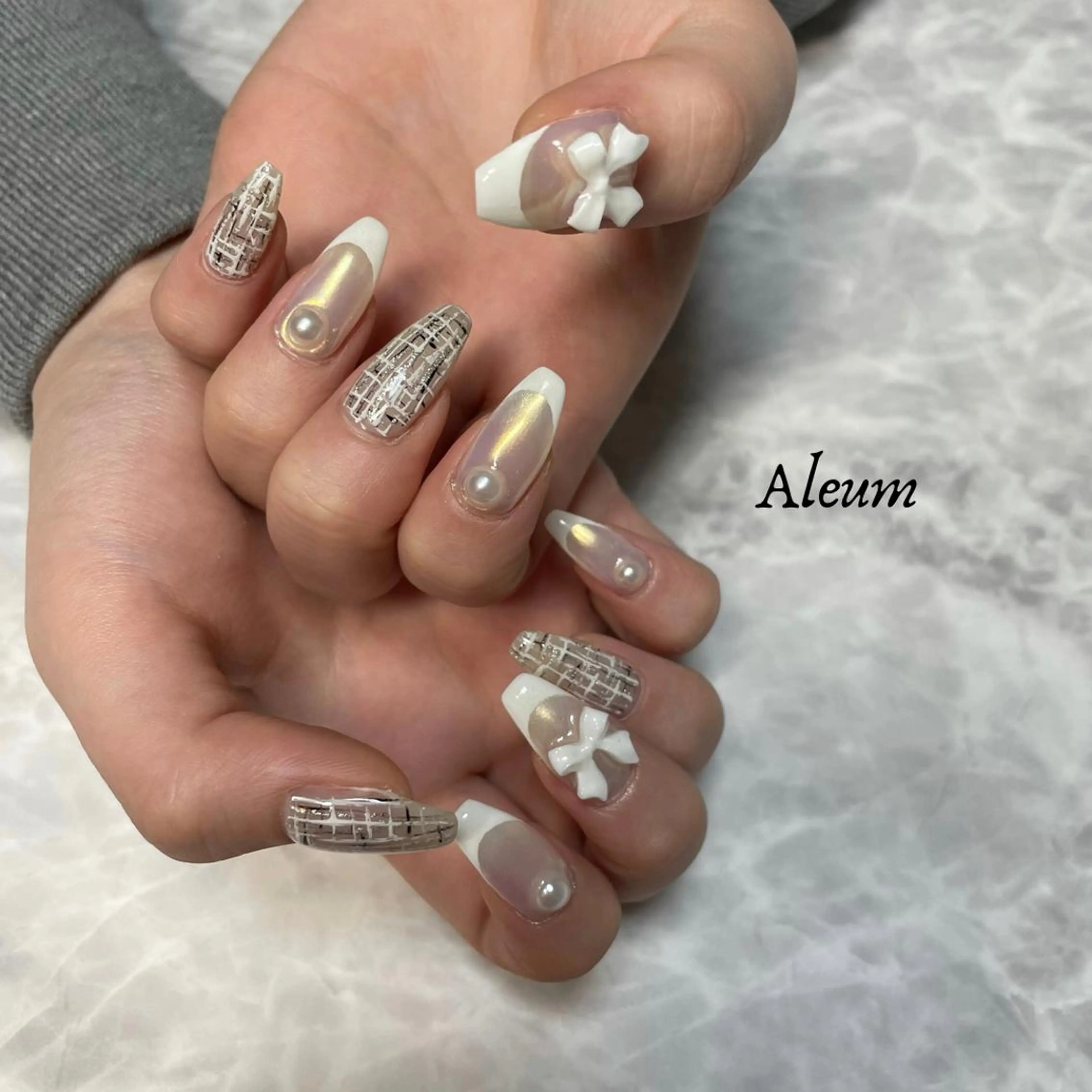 ネイル リボン ハンドネイル Aleum所属・Nail Salon Aleumのネイルデザイン