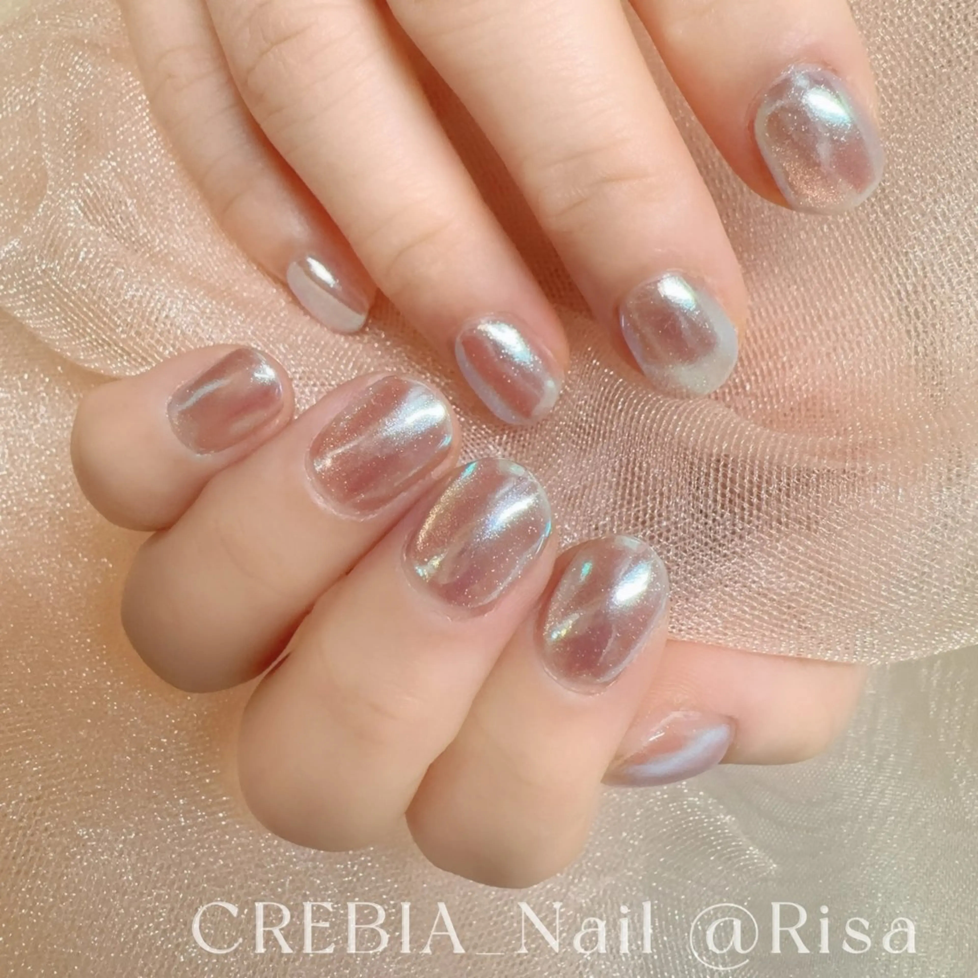 ネイル オーロラネイル マグネットネイル シルバー CREBIA beaute ネイル部所属・CREBIA @Risaのネイルデザイン