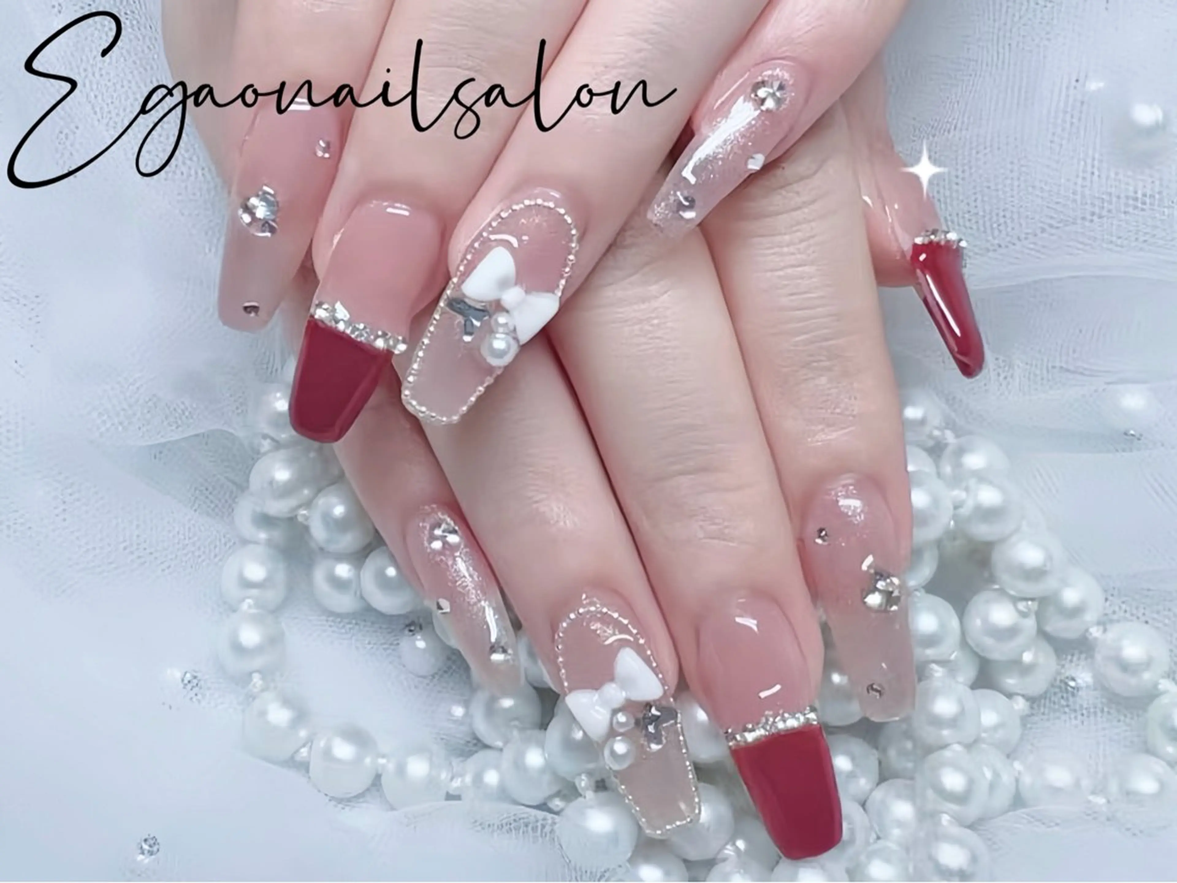 ネイル クリアネイル キラキラネイル リボン 夏ネイル ワンホンネイル ハンドネイル Egao Nail Salonのネイルデザイン