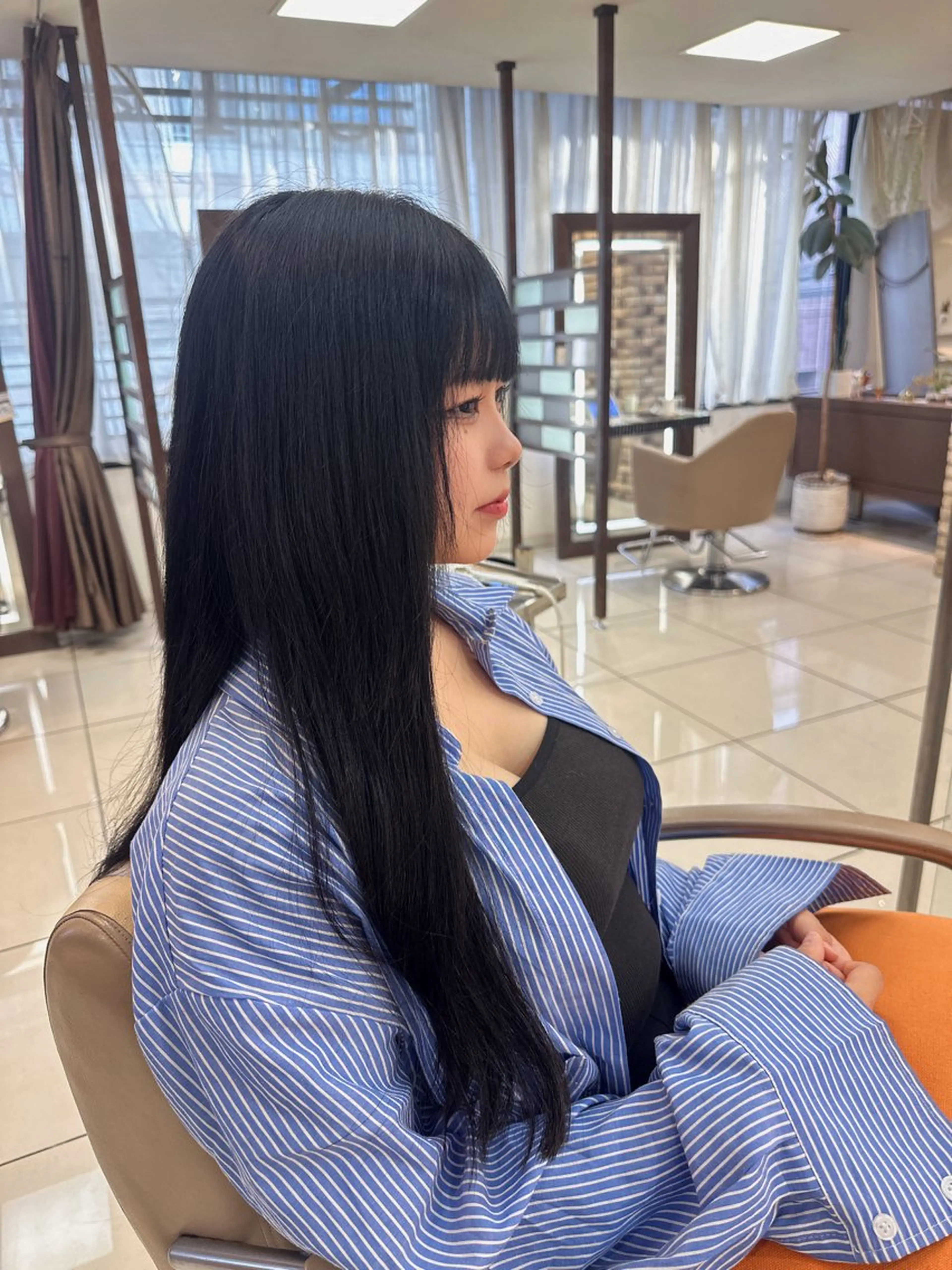 ラウンドマッシュシャ ドウニュアンスパーマのヘアスタイル