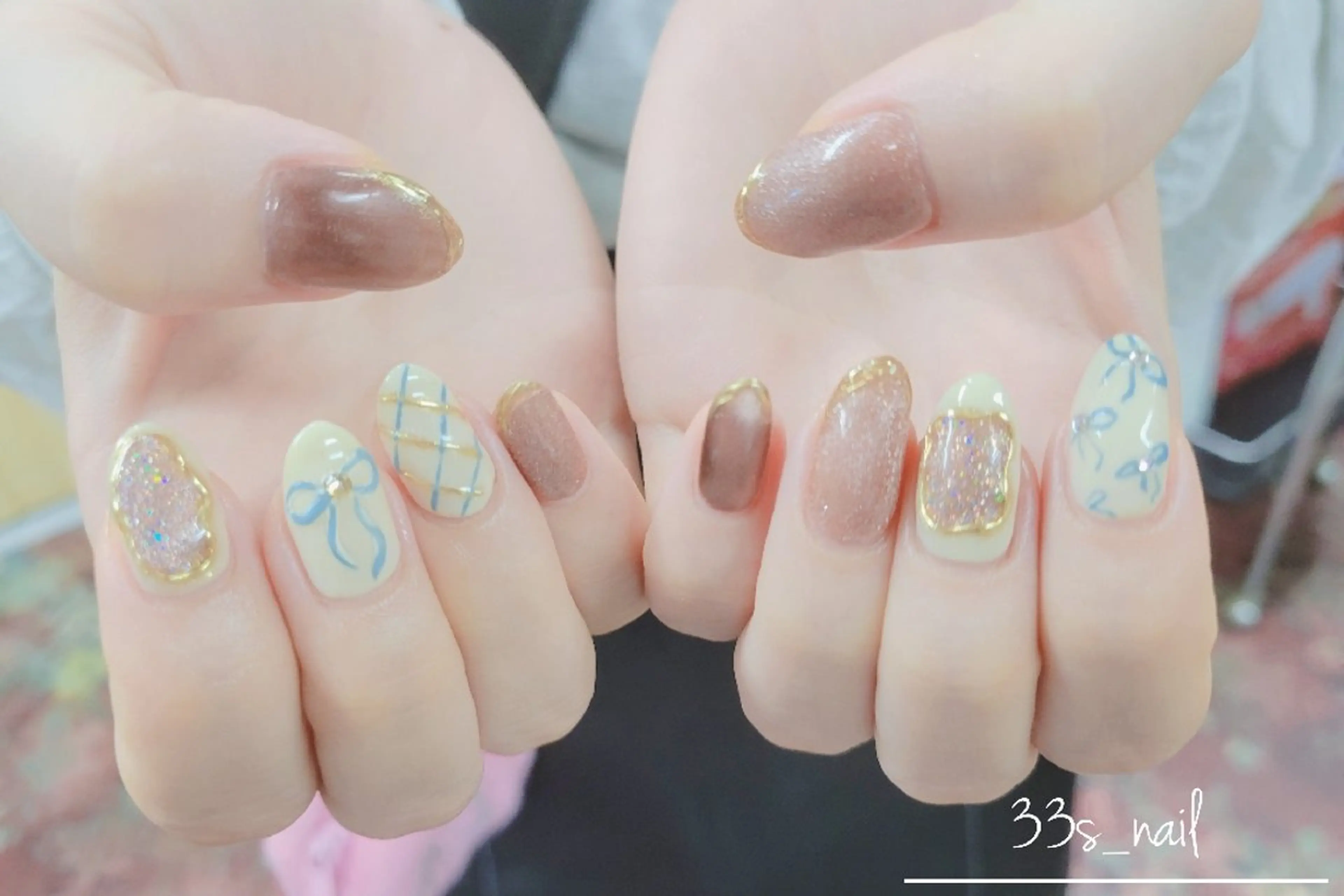 ネイル ブルー リボン 櫛の屋浜口店所属・櫛の屋浜口店 sumireのネイルデザイン