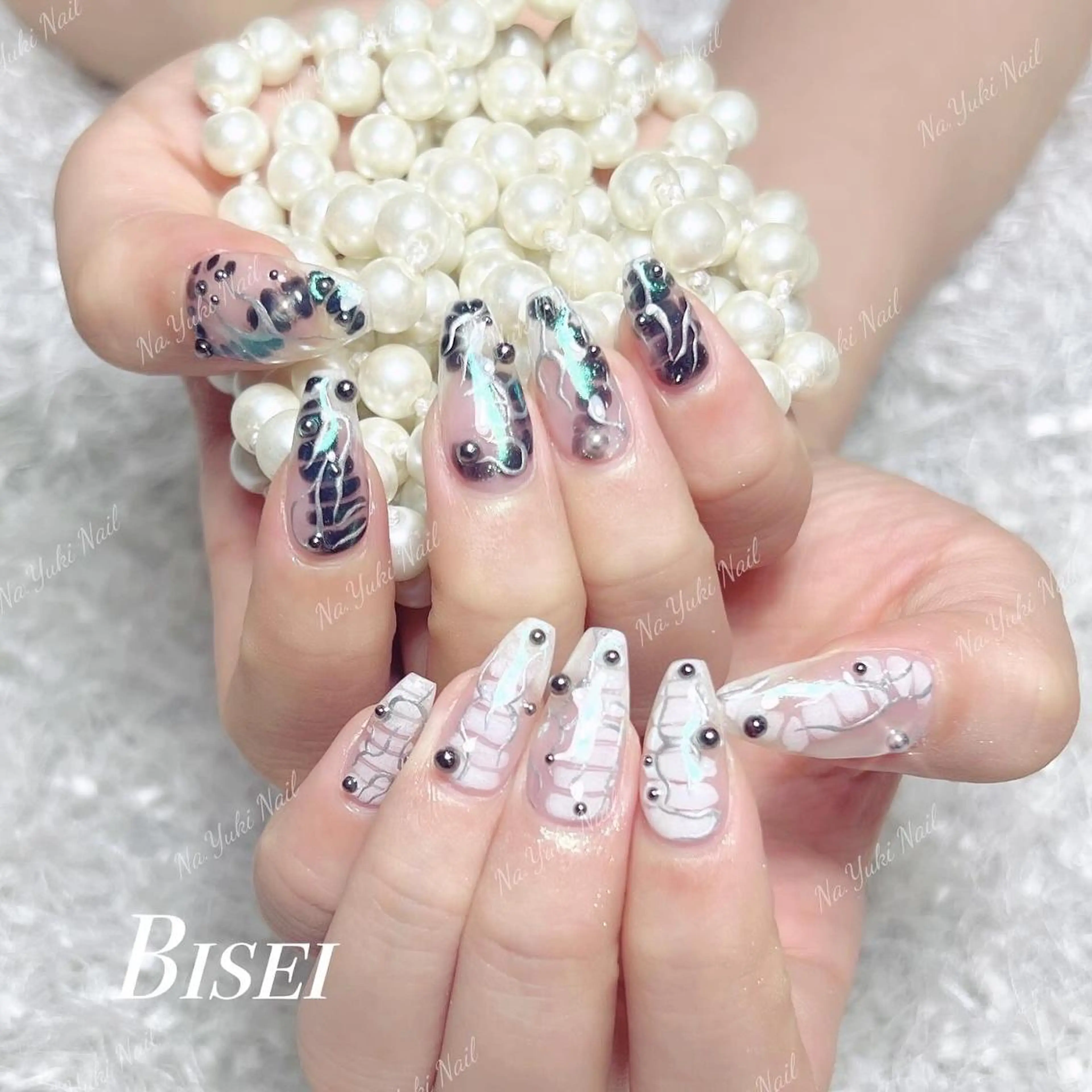 ネイル Queenie 🦋のネイルデザイン
