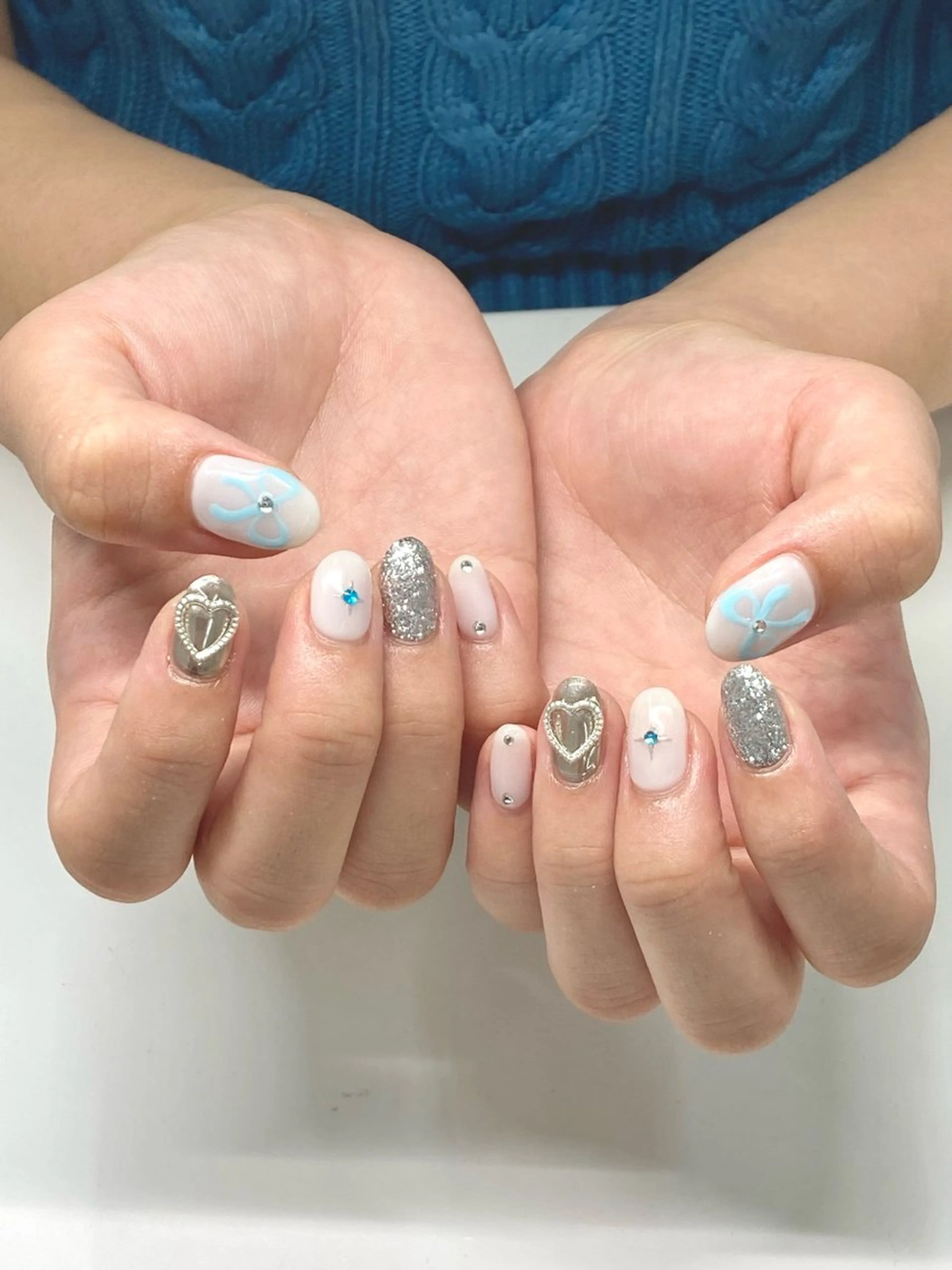 ネイル ブルー 持ち込み シルバー Nail Total beauty salon Laki所属・佐々木 優花のネイルデザイン