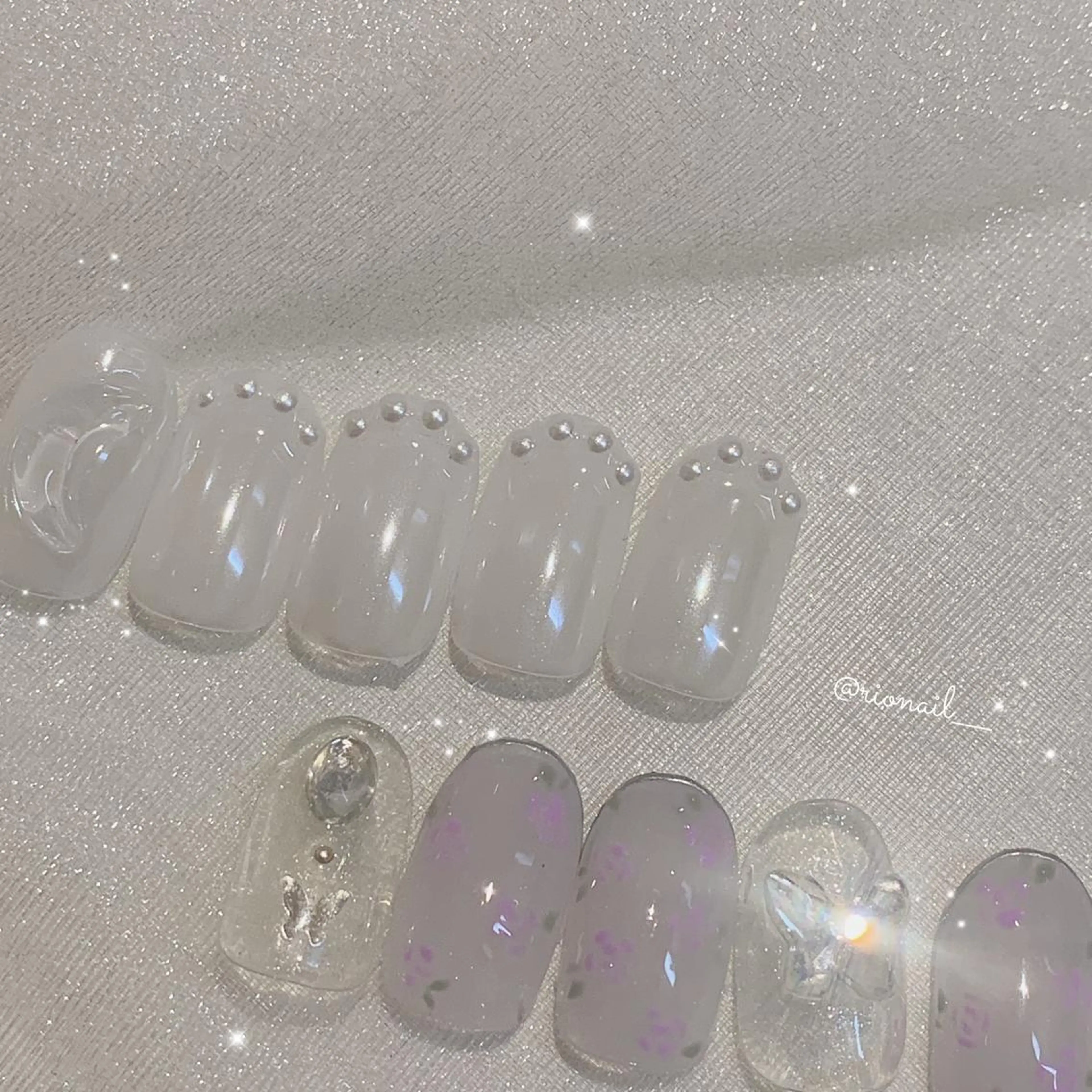 ネイル アートネイル オーロラネイル 𝘙𝘪𝘰𝘯𝘢 ...🕯🤍のネイルデザイン