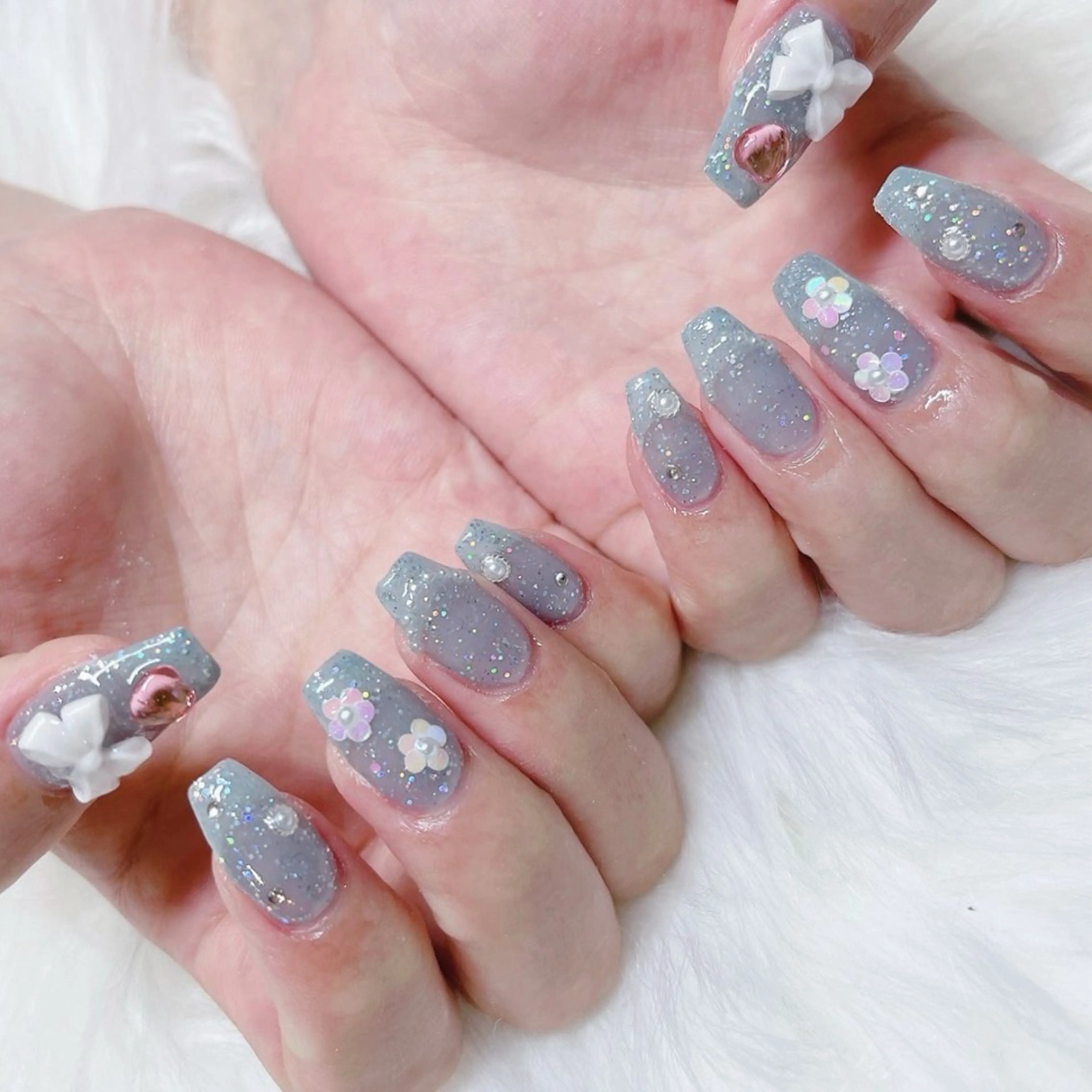 ネイル フラワーネイル ハート 水色 持ち込み リボン ハンドネイル Nail lieNのネイルデザイン