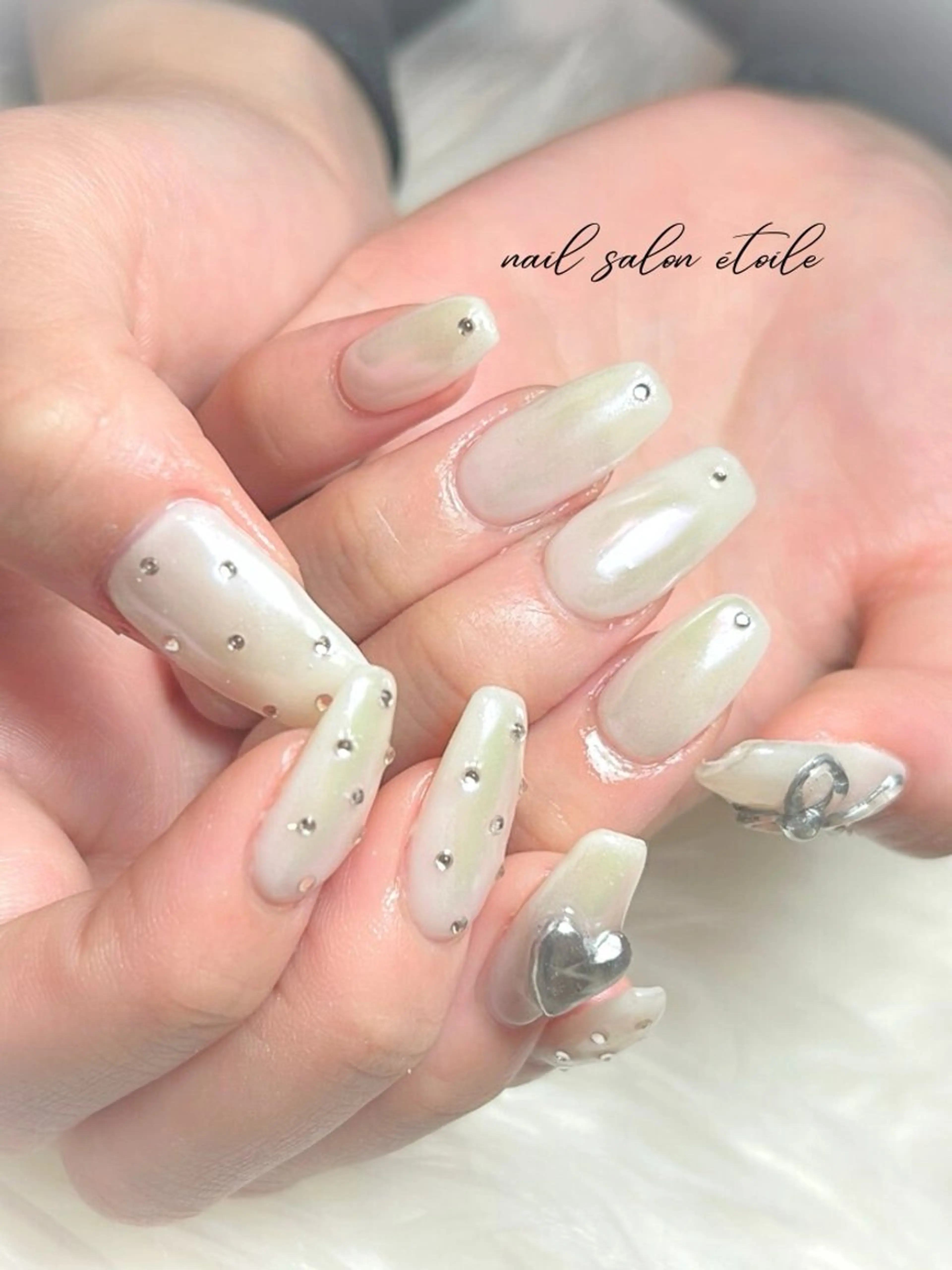 ネイル オーロラネイル ハート ロングネイル ストーンネイル ハンドネイル nail salon étoileのネイルデザイン