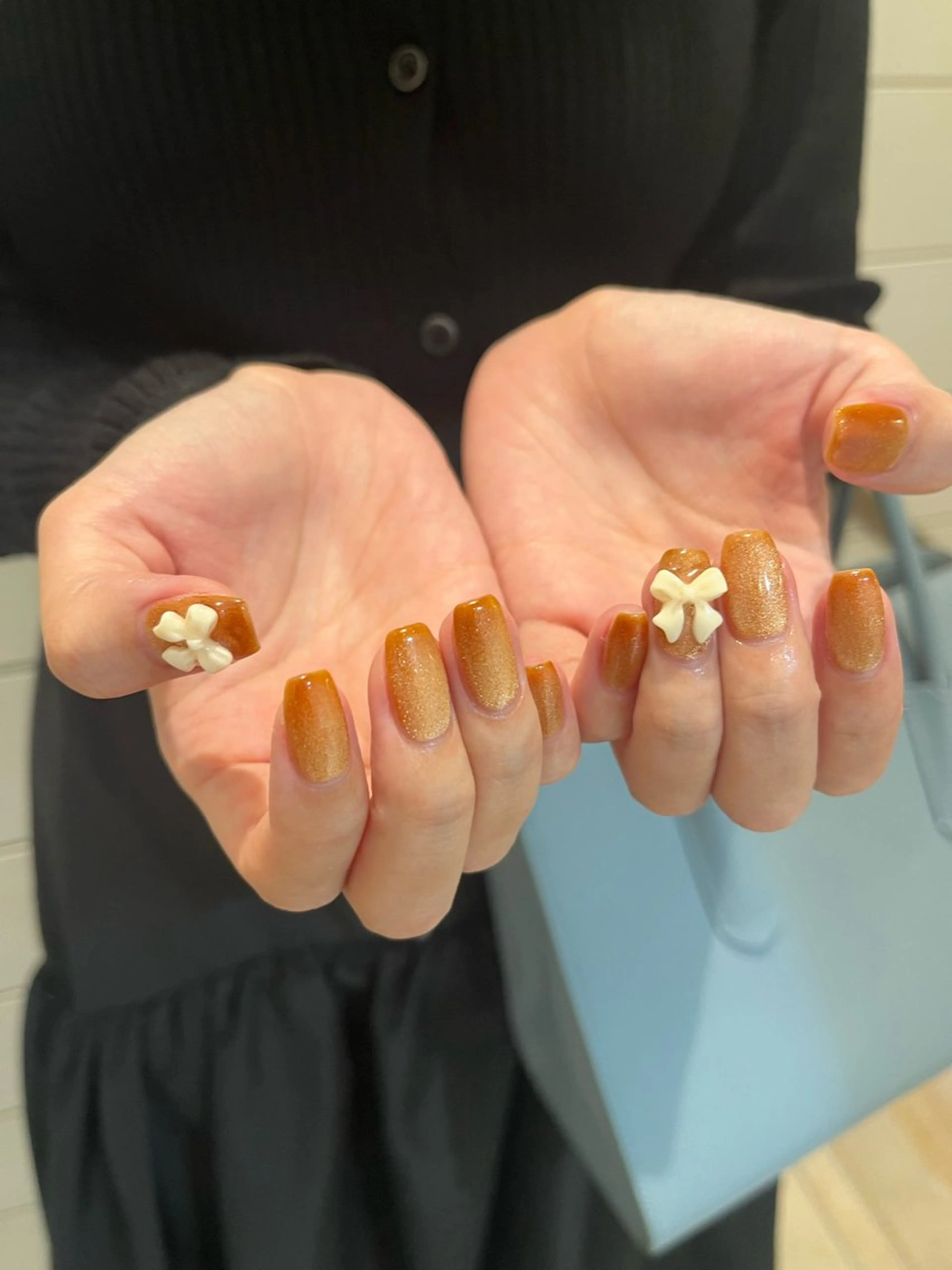 ネイル マグネットネイル オレンジ リボン Momone /渋谷/パラジェルのネイルデザイン