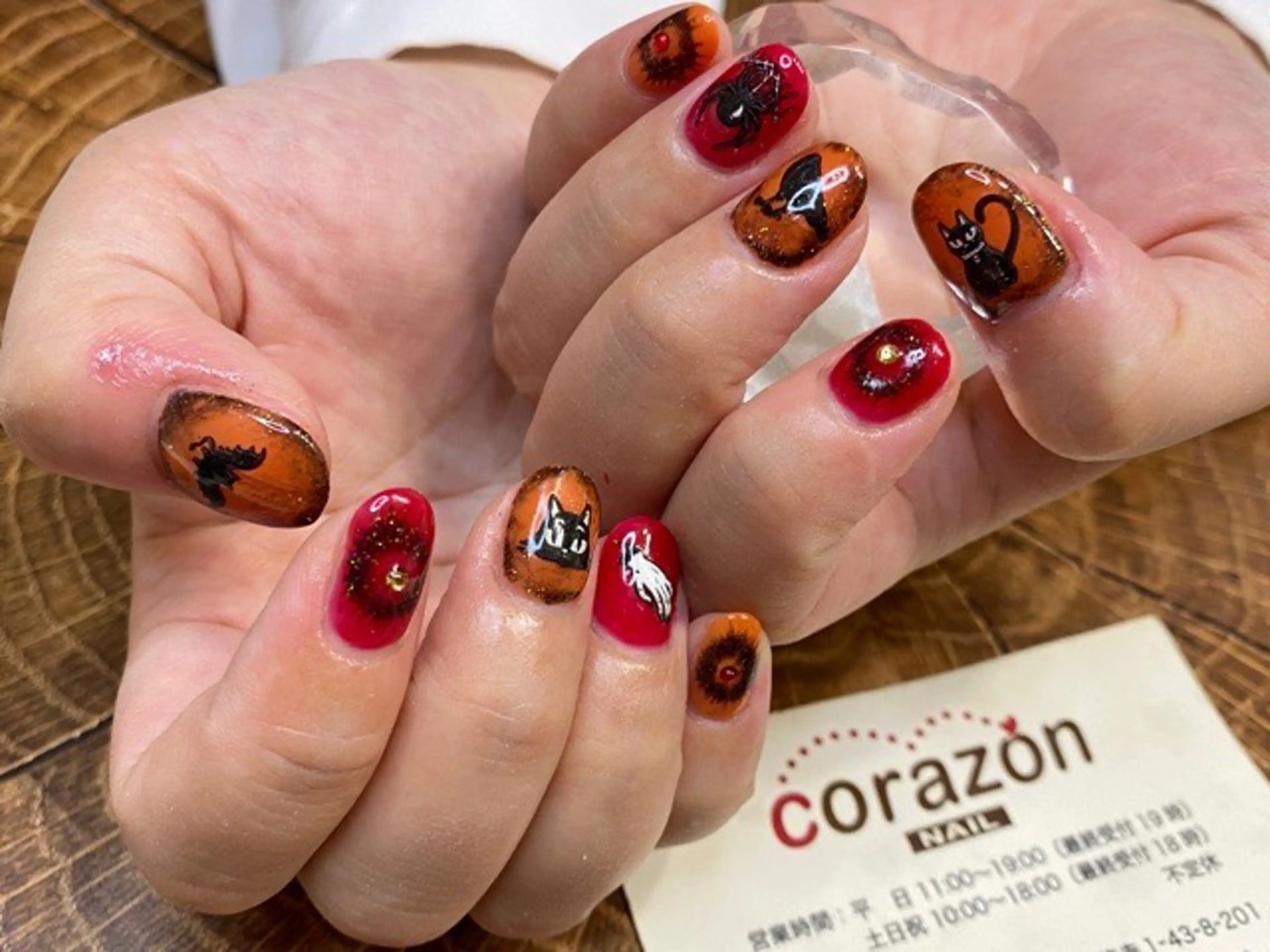 ネイル ハロウィン オレンジ 赤色 corazon所属・ネイリスト aicoのネイルデザイン