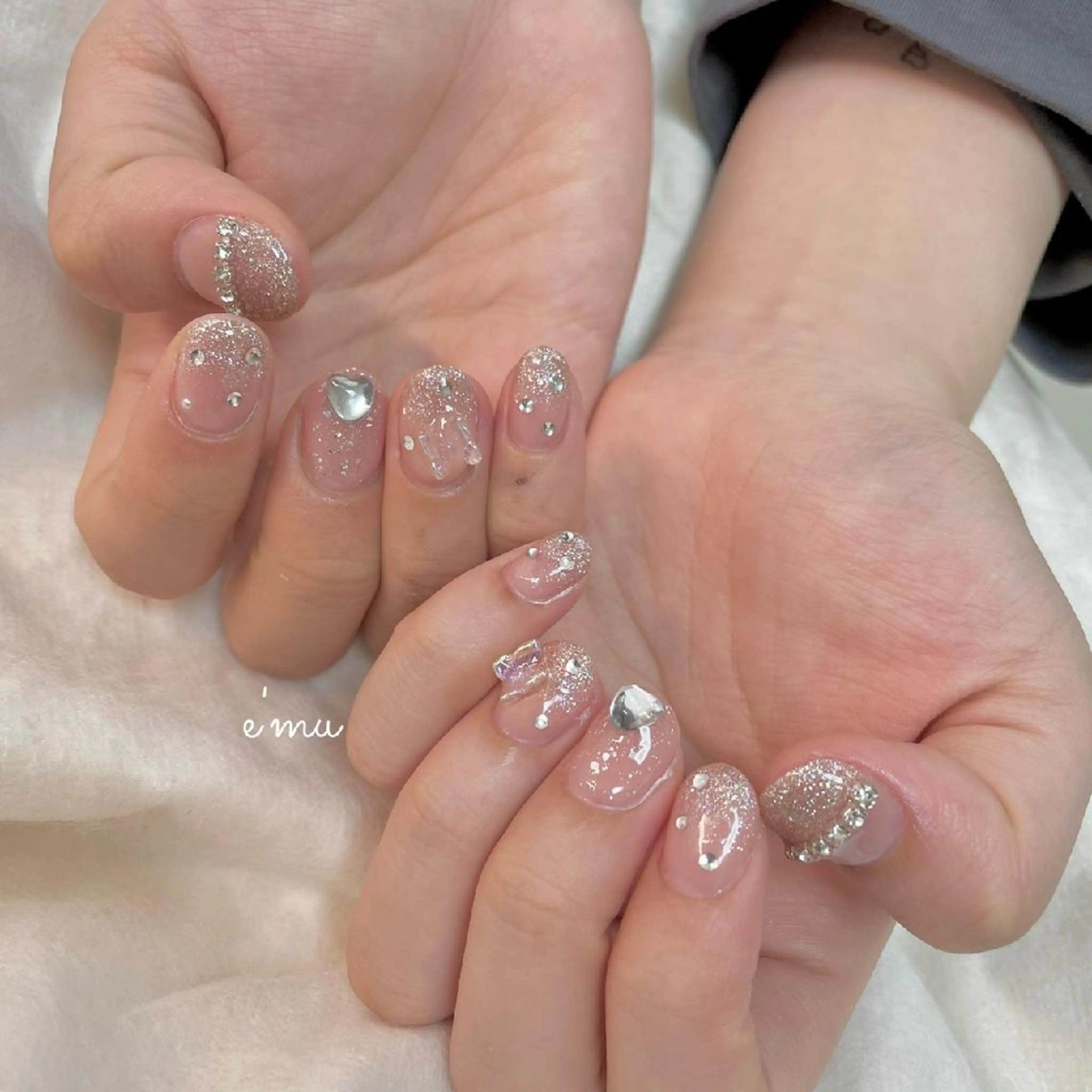 ネイル キラキラネイル 韓国ネイル 春ネイル ワンホンネイル nail salon e'mu💐のネイルデザイン