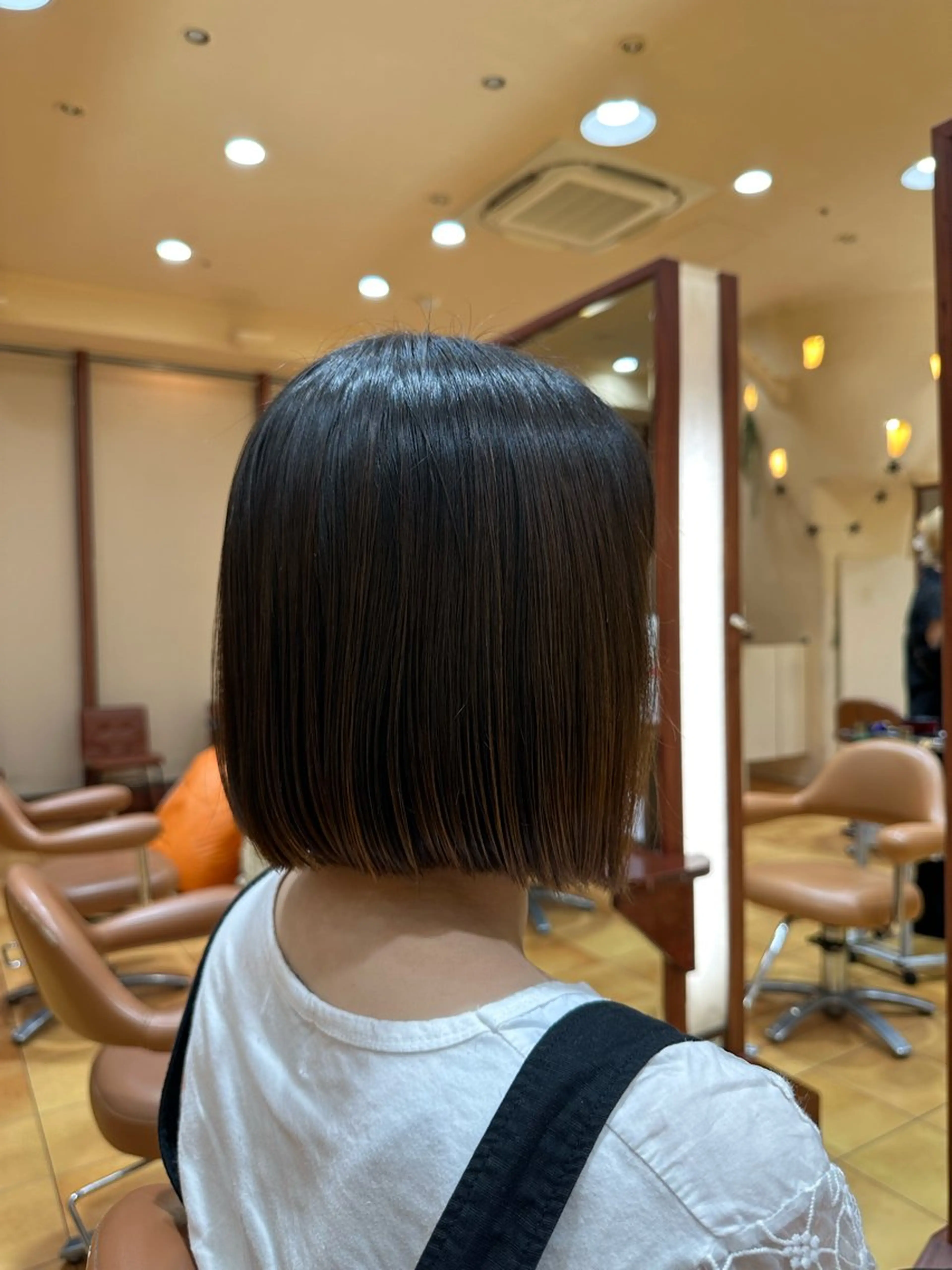 ミディアム とうい/パーマボブ/ くせ毛/丸みボブのヘアスタイル