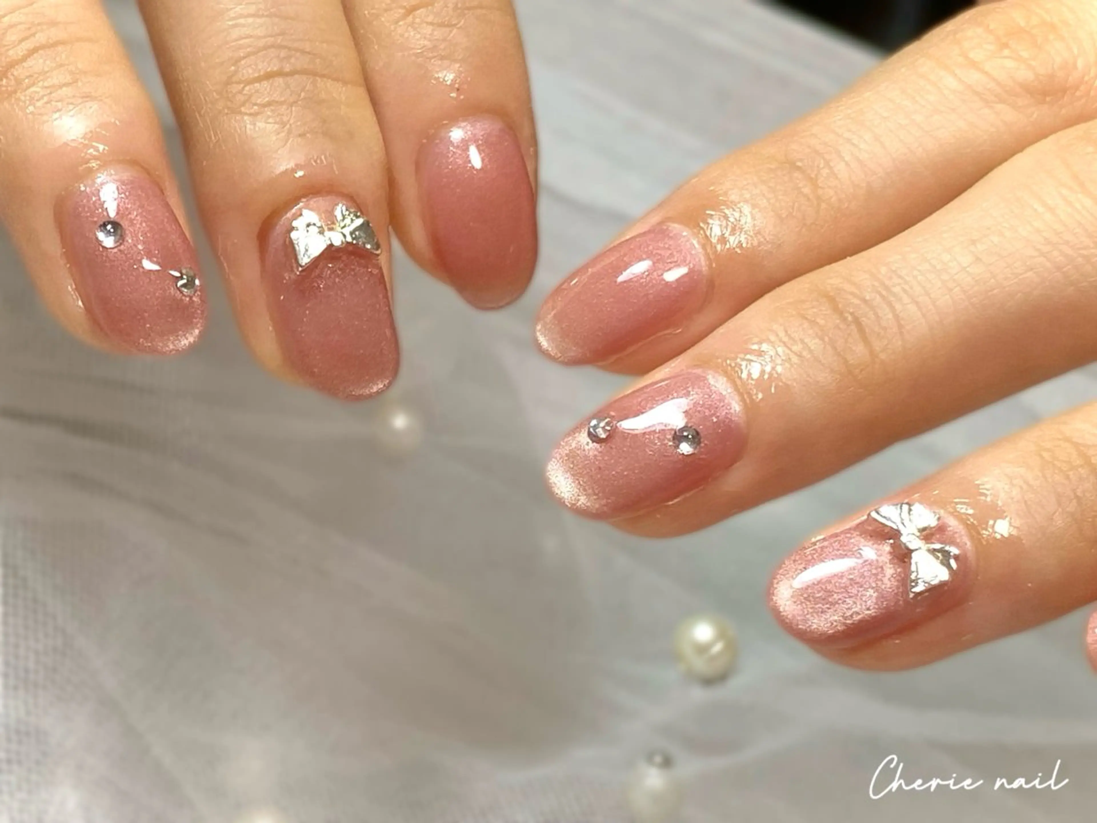 ネイル ジェルネイル マグネットネイル オフィスネイル ピンク リボン ハンドネイル Cherienail yunaのネイルデザイン