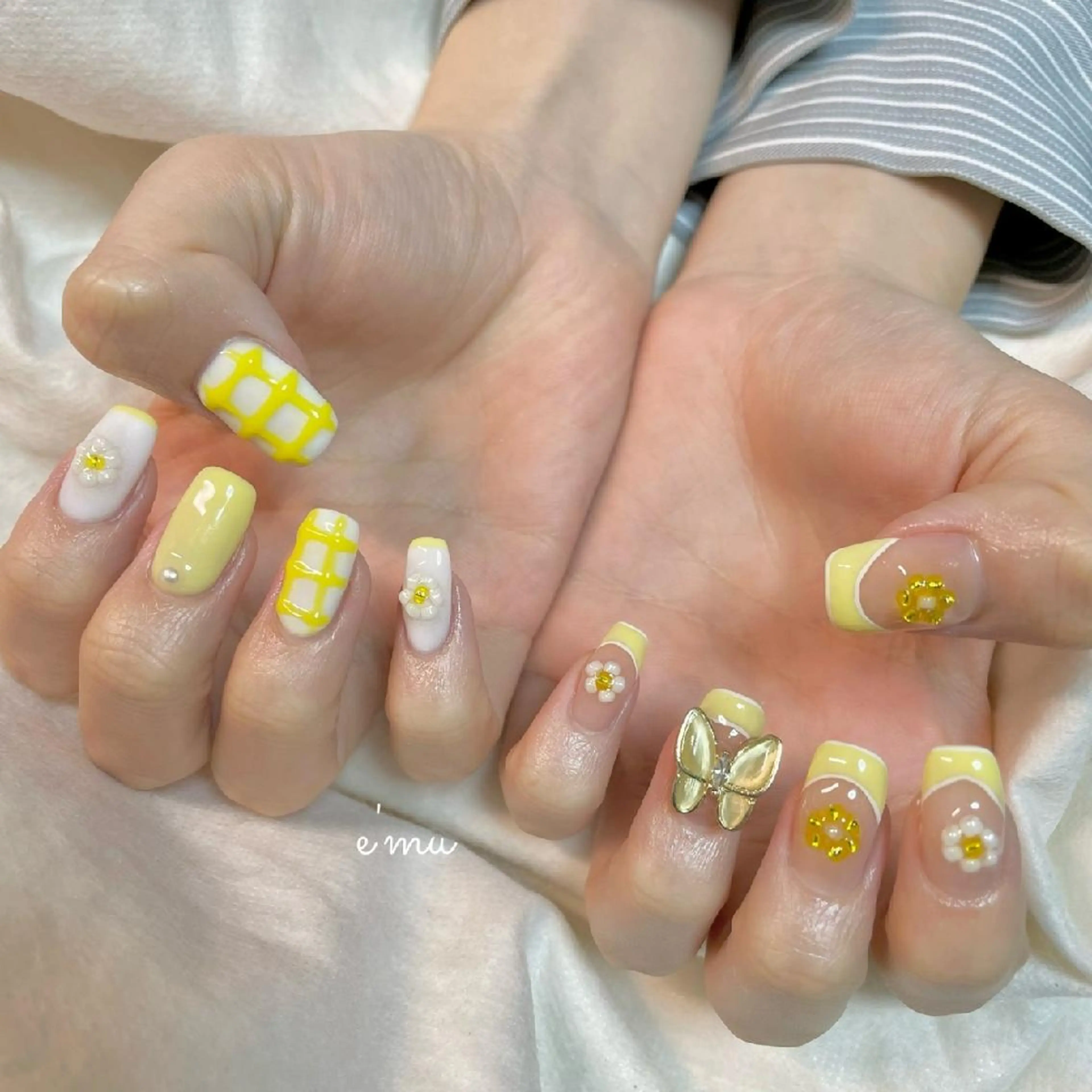 ネイル フラワーネイル フレンチネイル 春ネイル 黄色 nail salon e'mu💐のネイルデザイン