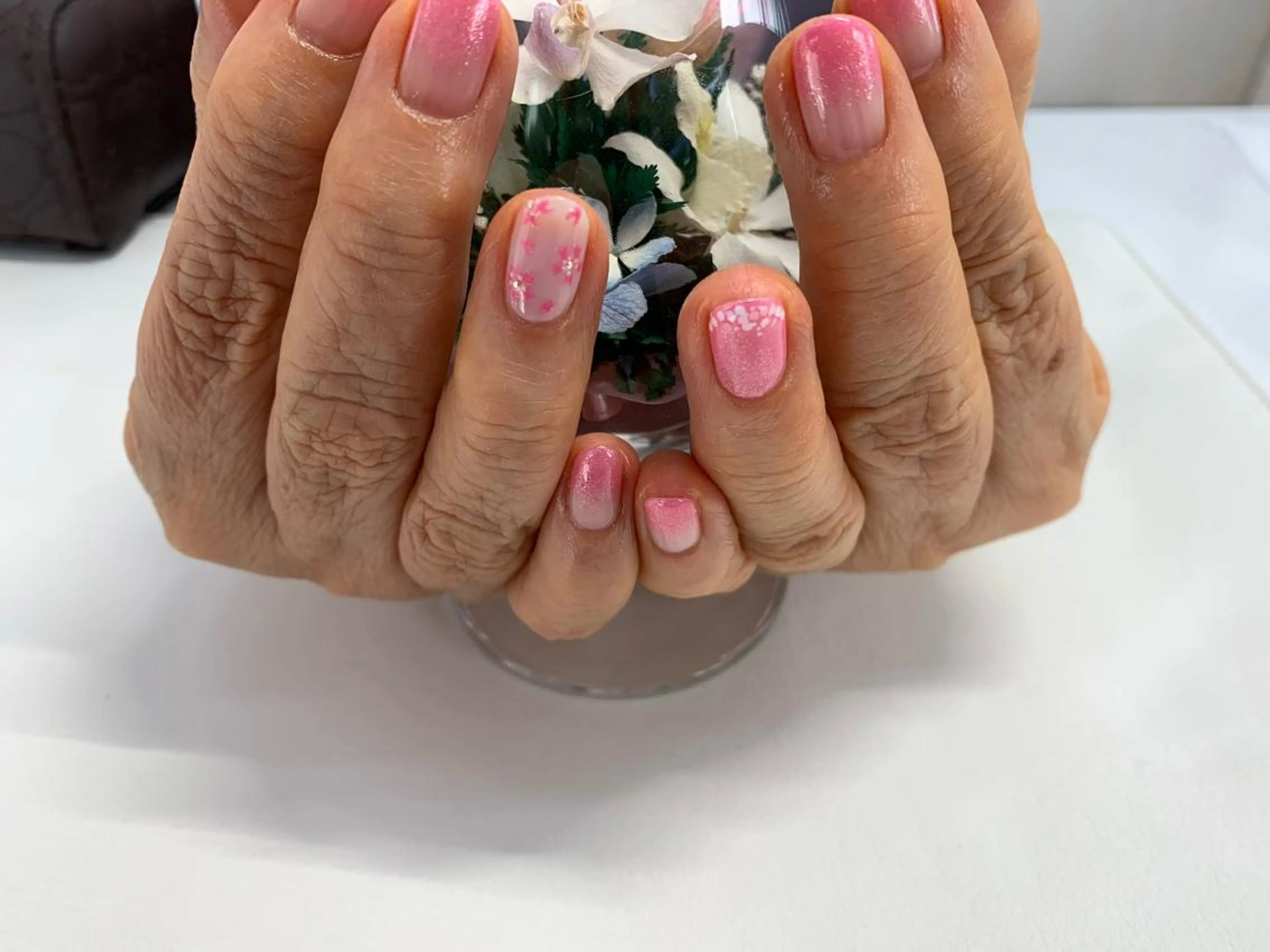 ネイル アートネイル 桜ネイル ハンドネイル ハンドケア Mule Beauty Salon所属・ミュール ビューティーサロンのネイルデザイン