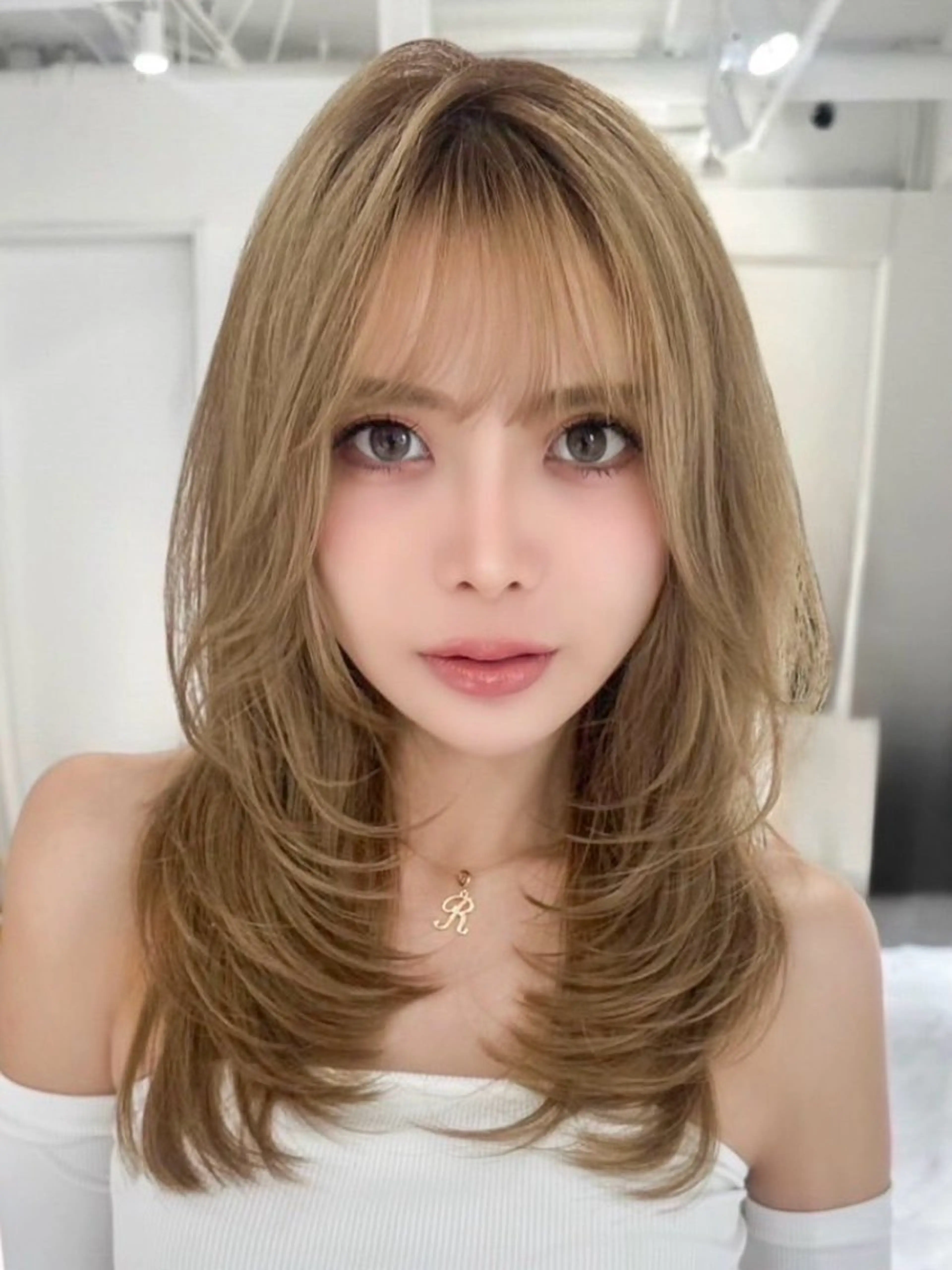 ミディアム 顔周りカット レイヤーカット 小顔カット CIELO beautyバインドロック専門店所属・CIELO モデル募集のヘアスタイル