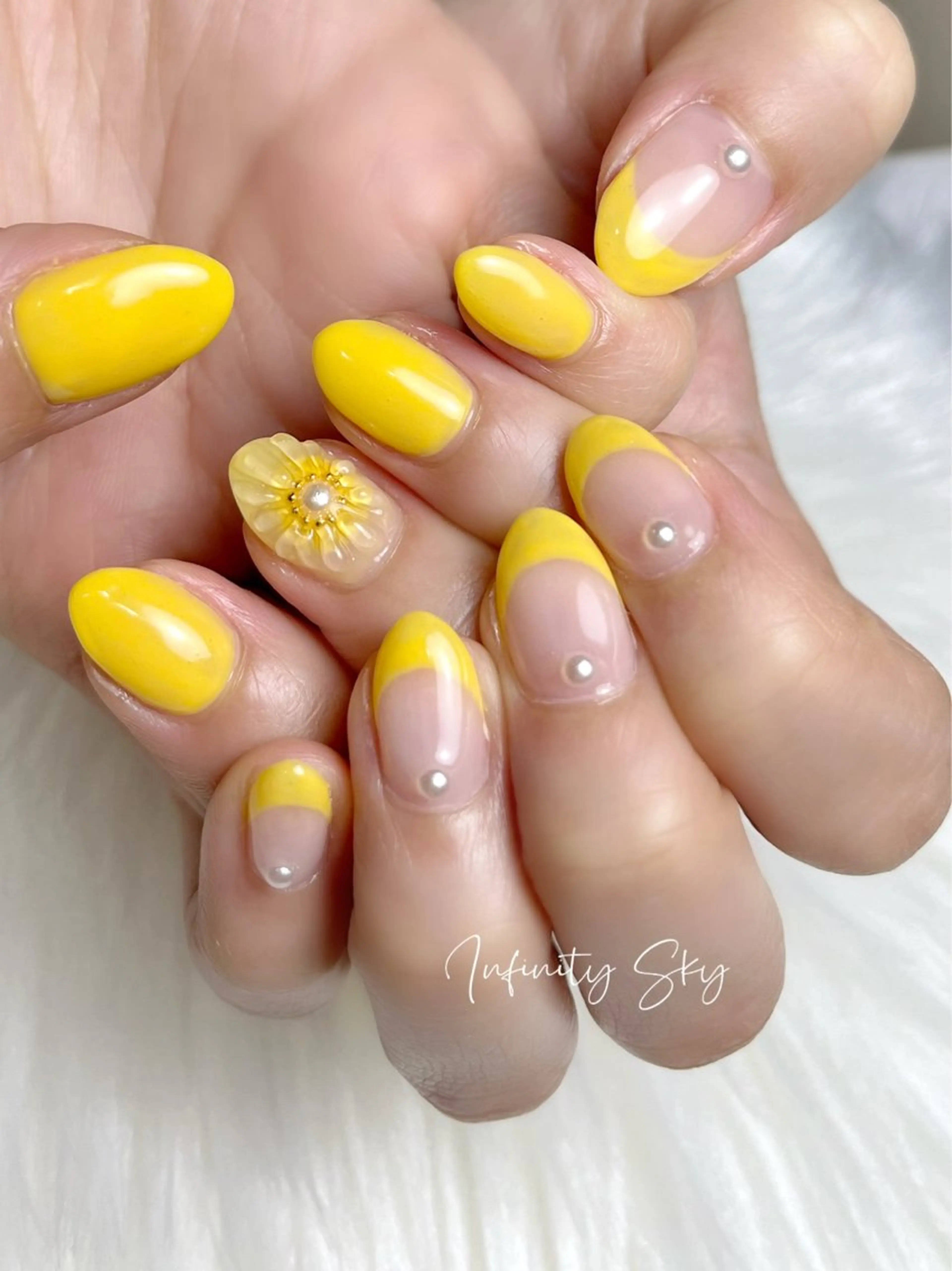ネイル フラワーネイル 黄色 infinity skyのネイルデザイン